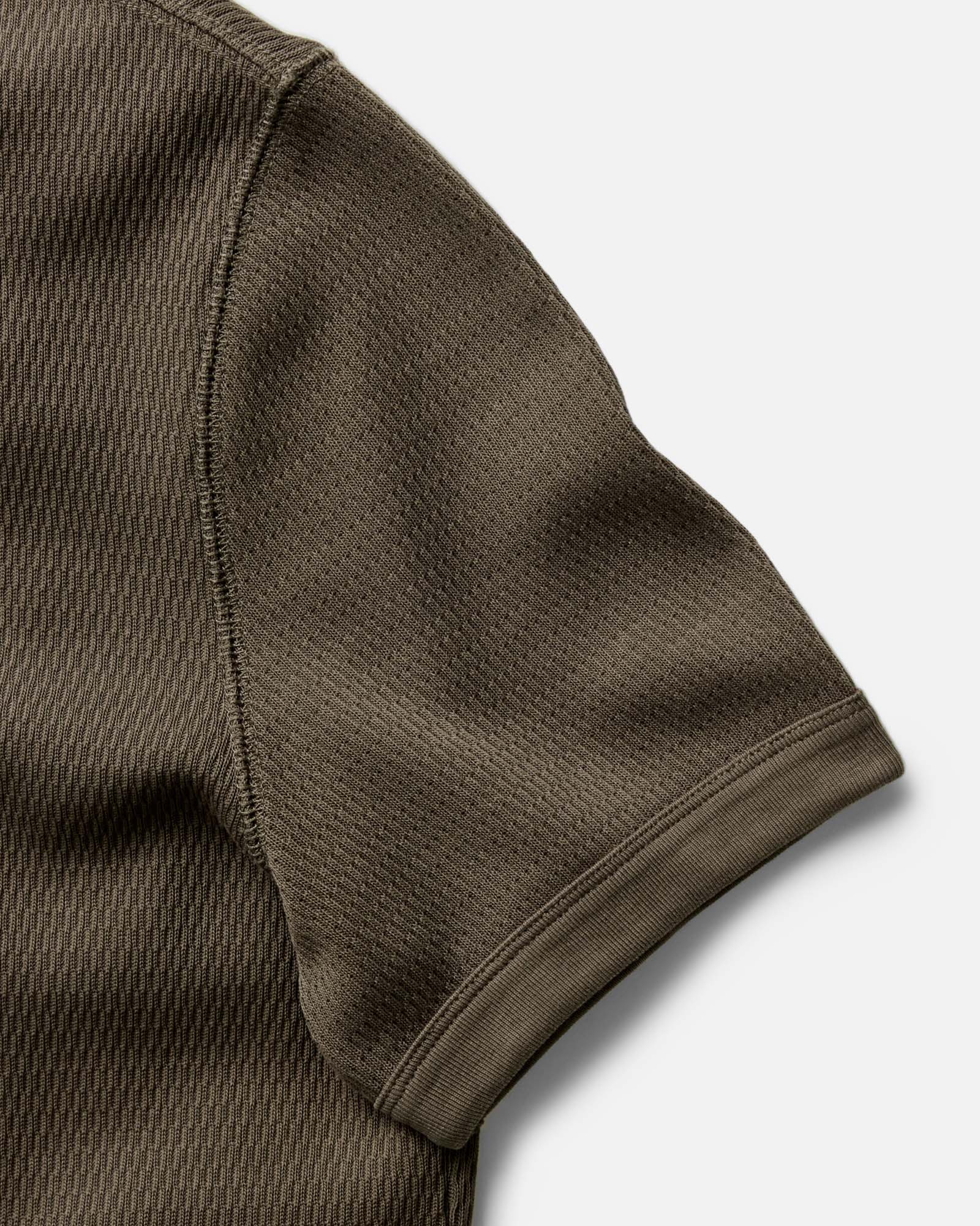 material shot of the ribbed sleeves on The Organic Cotton Short Sleeve Crew in Fatigue Olive Waffle, Knits by Taylor Stitch