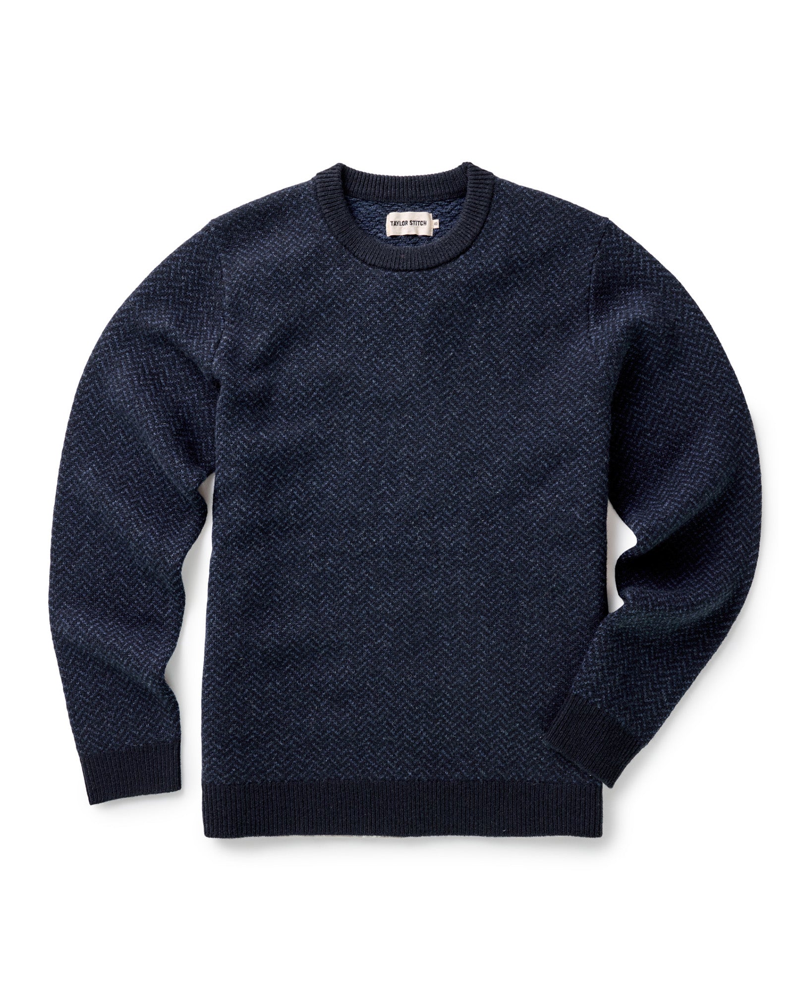 flatlay of The Eddy Crew in Heather Marine Herringbone, Knits by Taylor Stitch