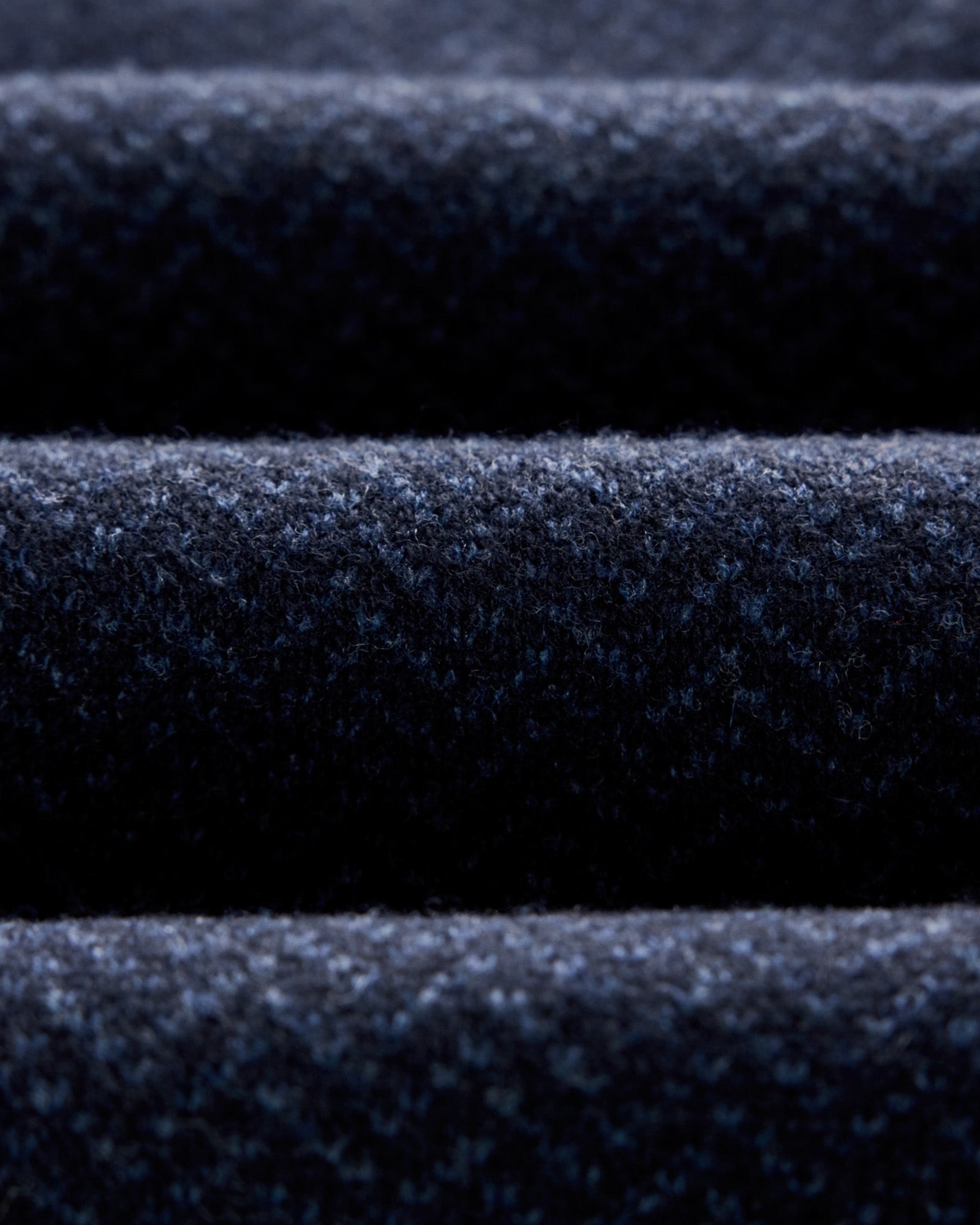 material shot of the fabric on The Eddy Crew in Heather Marine Herringbone, Knits by Taylor Stitch