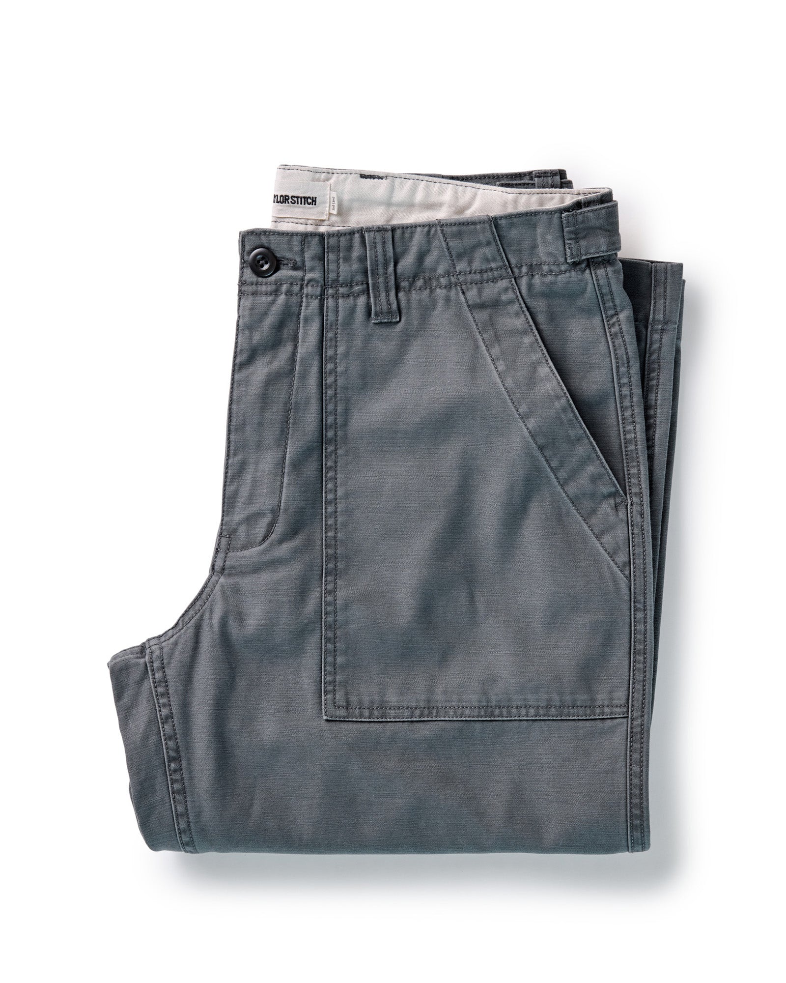 folded flatlay of The Surplus Pant in Faded Black Reverse Sateen, Bottoms by Taylor Stitch