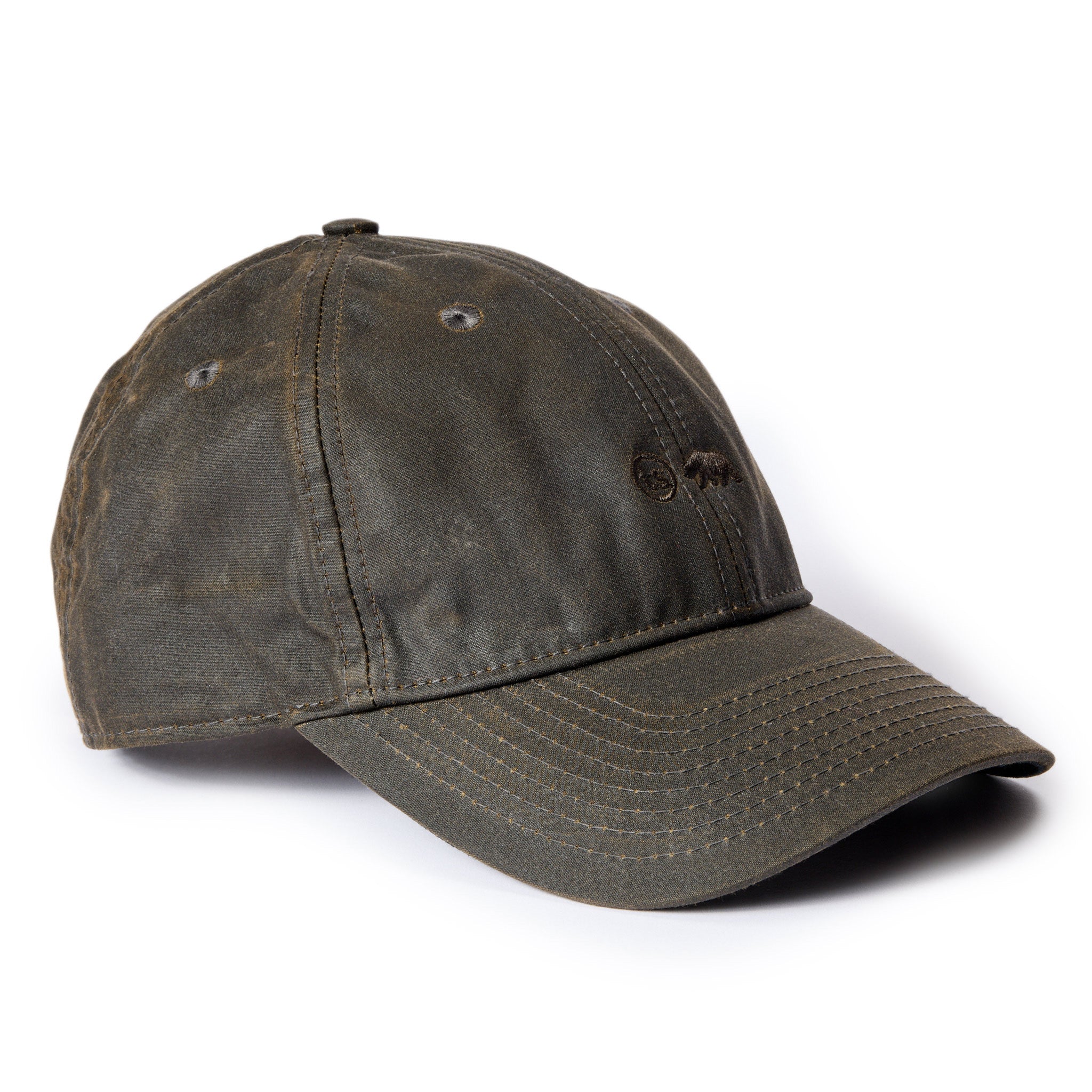 flatlay of The Ball Cap in Soil Waxed Canvas, from an angle, Accessories by Taylor Stitch