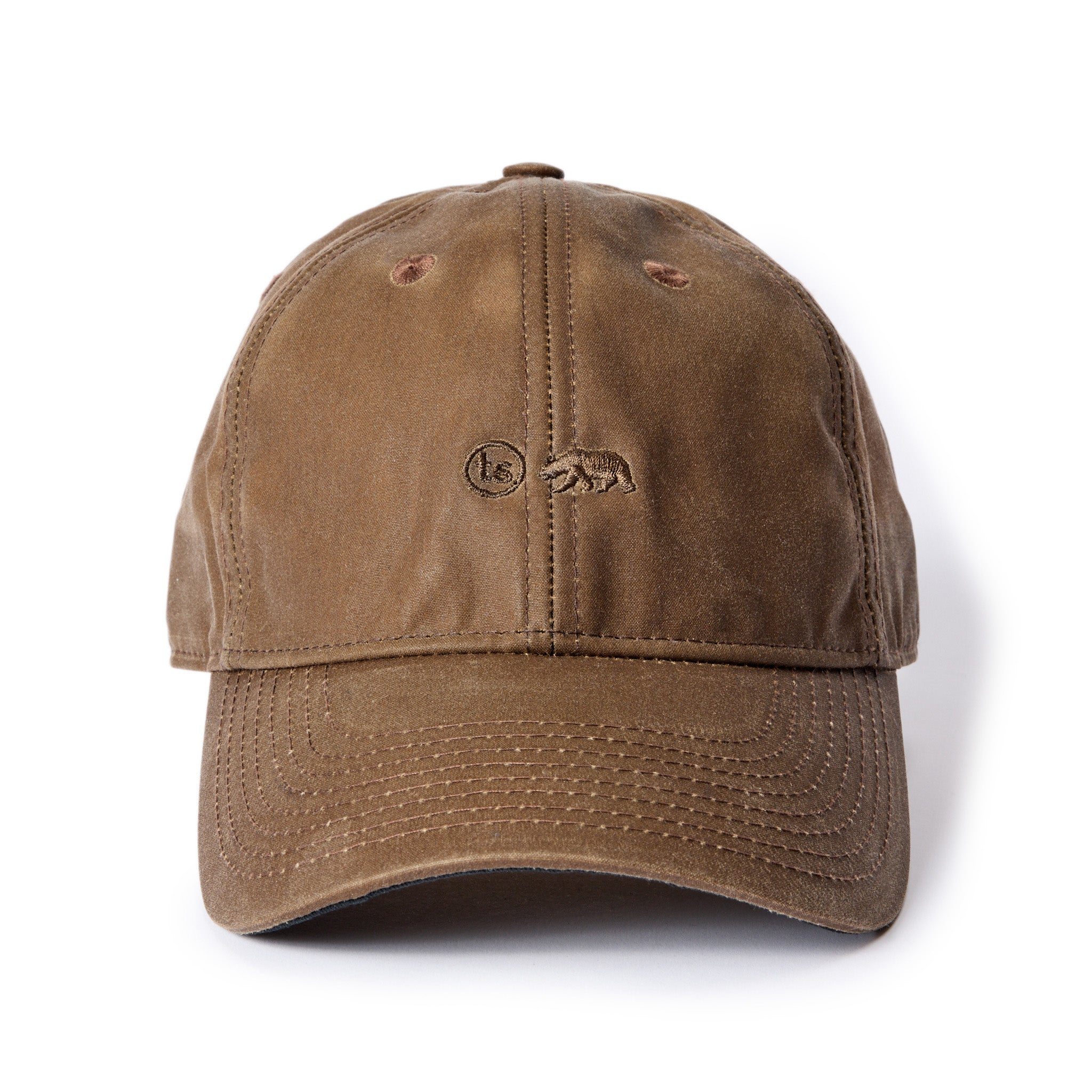 flatlay of The Ball Cap in Dark Khaki Waxed Canvas, Accessories by Taylor Stitch