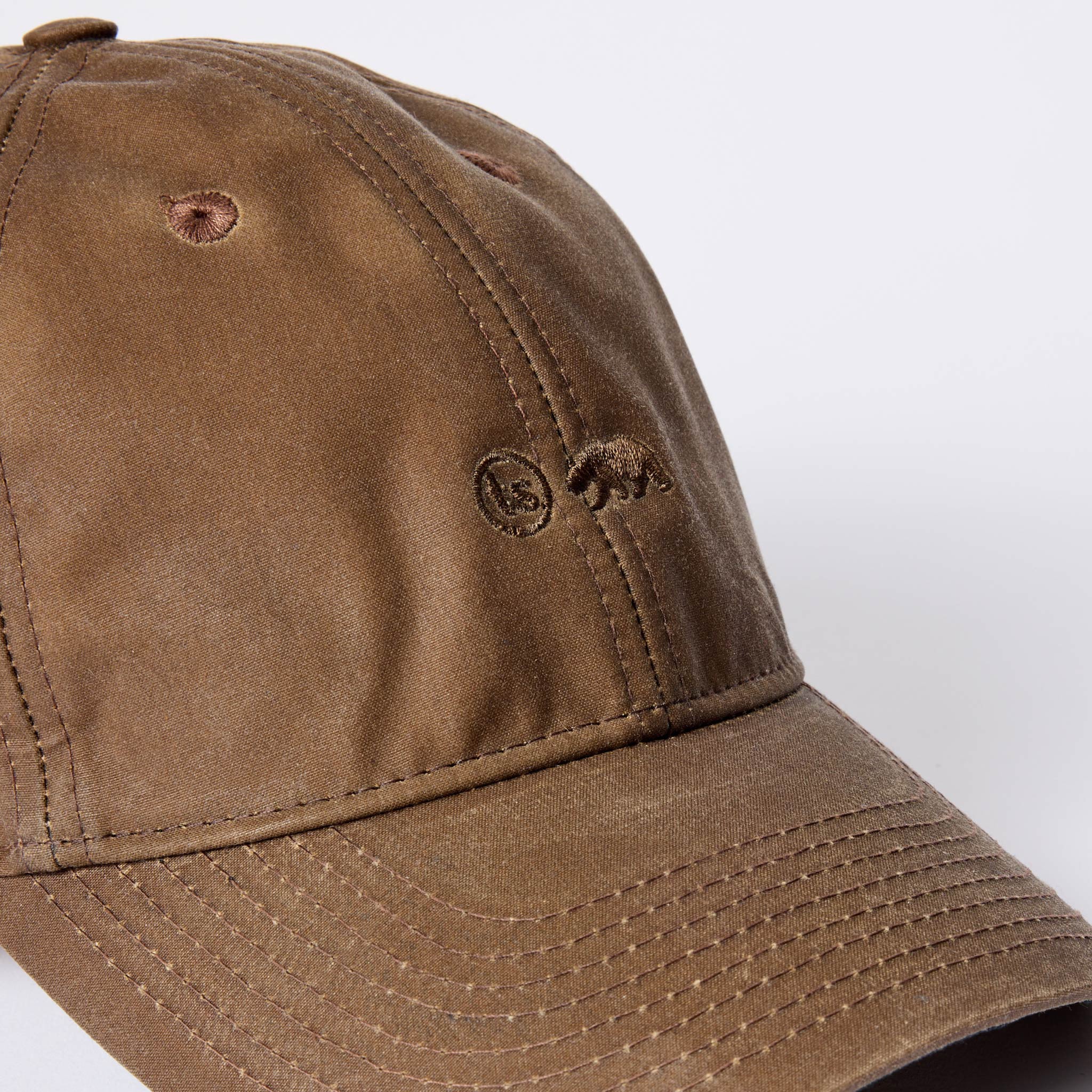 material shot of The Ball Cap in Dark Khaki Waxed Canvas, Accessories by Taylor Stitch