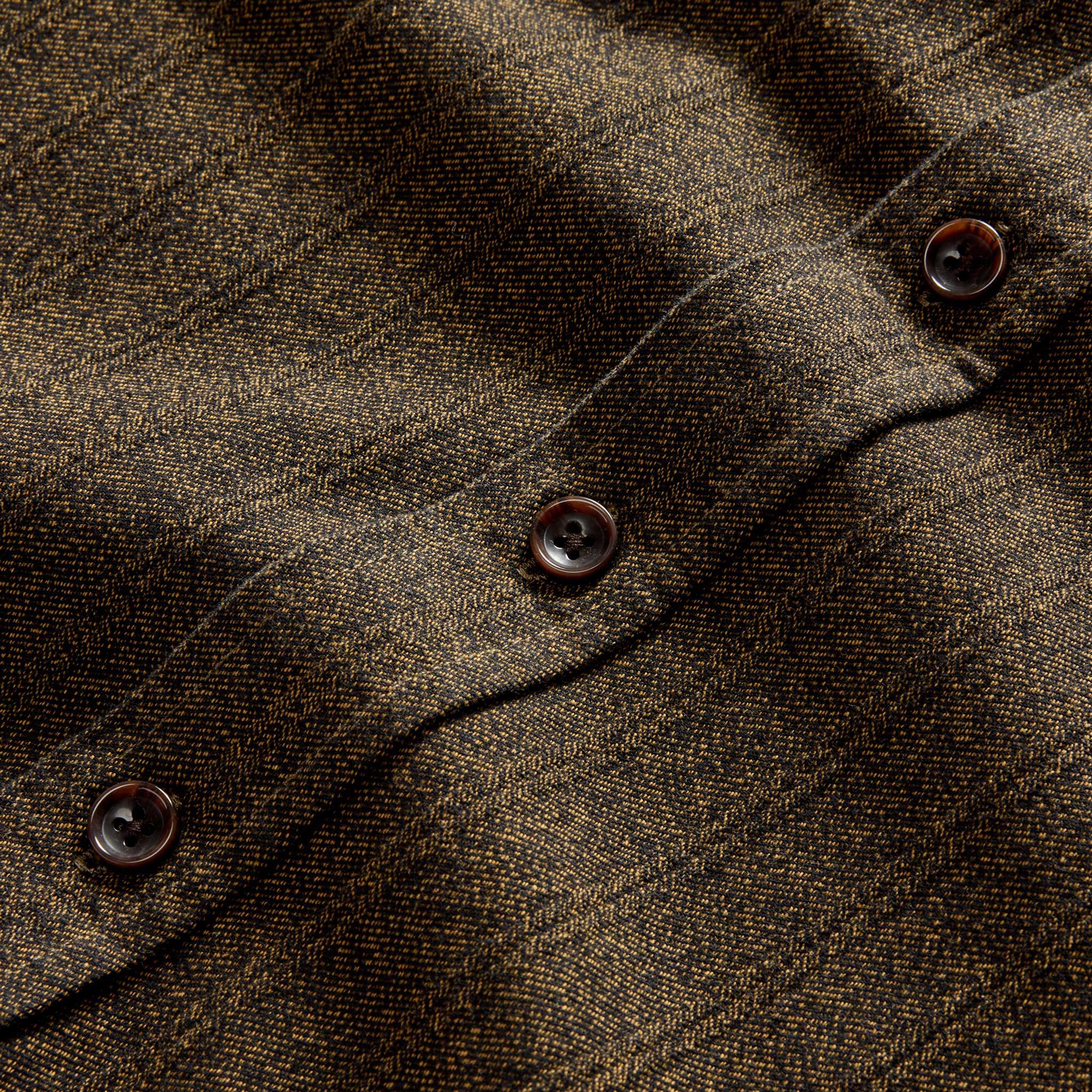 material shot of the horn buttons on The Utility Shirt in Tarnished Brass Herringbone, Wovens by Taylor Stitch