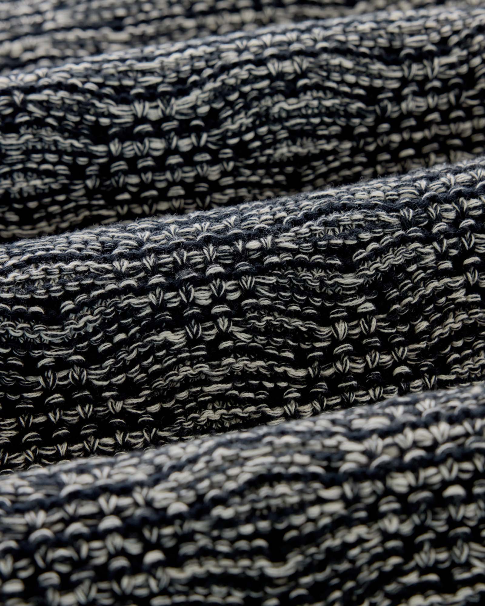 material shot of the sleeve on The Chatham Crew in Marine Stripe Jacquard, Knits by Taylor Stitch