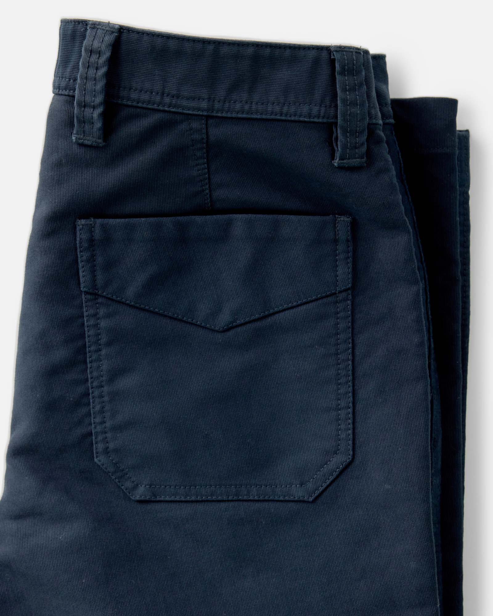 material shot of the back pocket on The Deck Pant in Dark Navy Bedford Cord, Bottoms by Taylor Stitch
