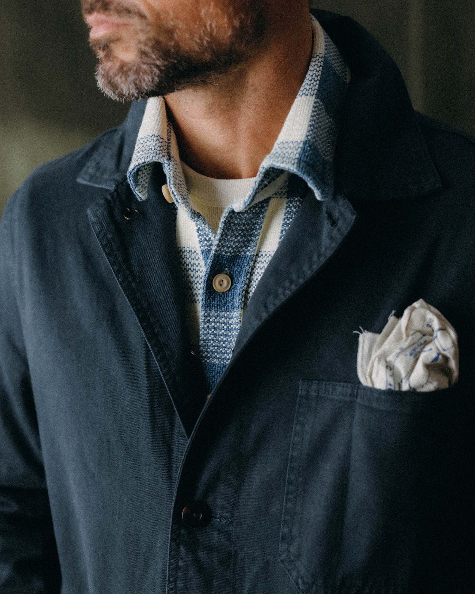 fit model buttoning the front of The Ojai Jacket in Organic Navy Foundation Twill, Outerwear by Taylor Stitch