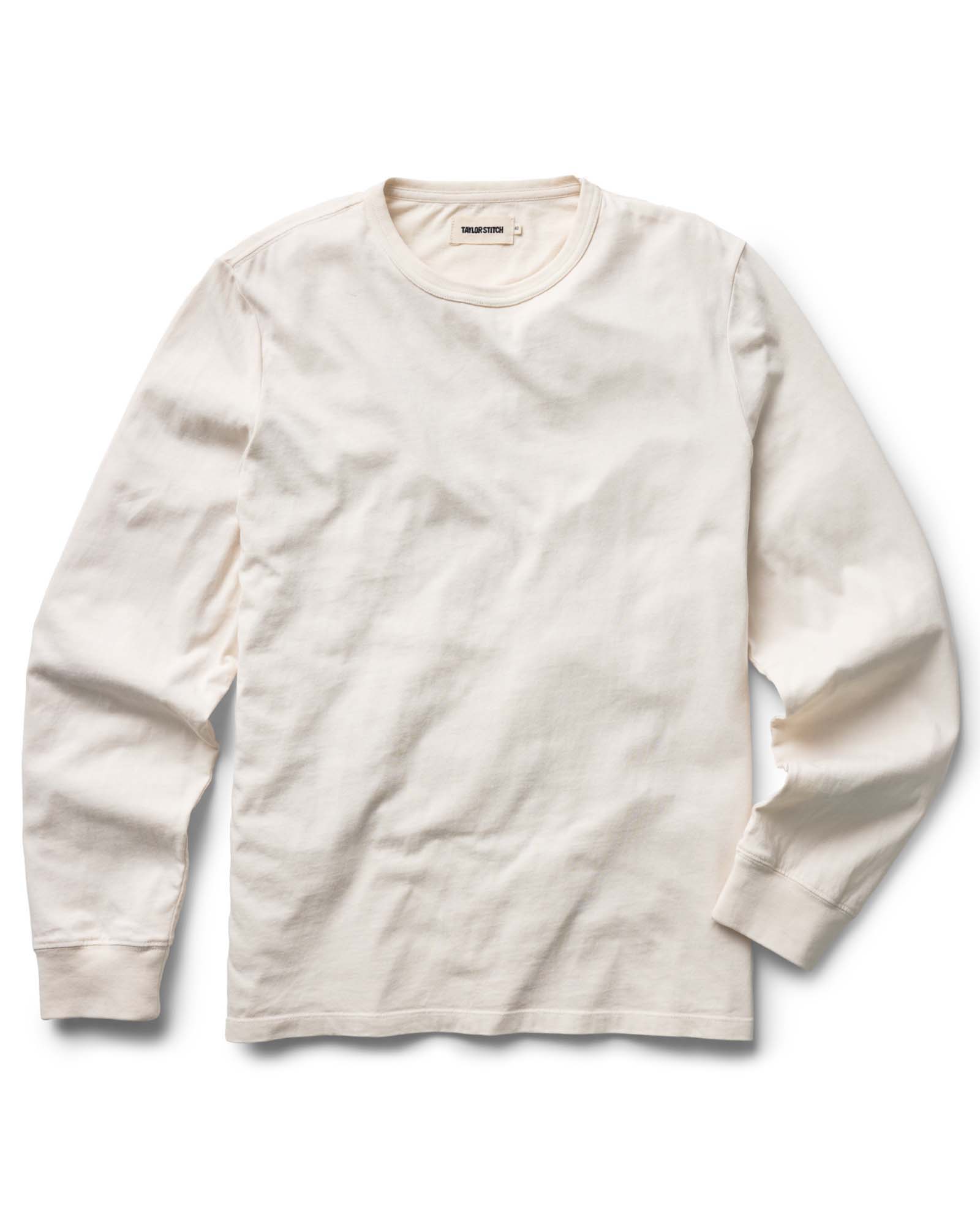 flatlay of The Organic Cotton Long Sleeve Tee in Vintage White, Knits by Taylor Stitch