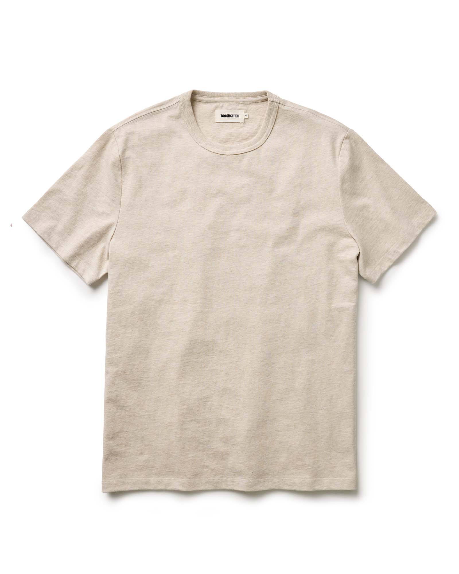 flatlay of The Organic Cotton Tee in Heather Oat, Knits by Taylor Stitch