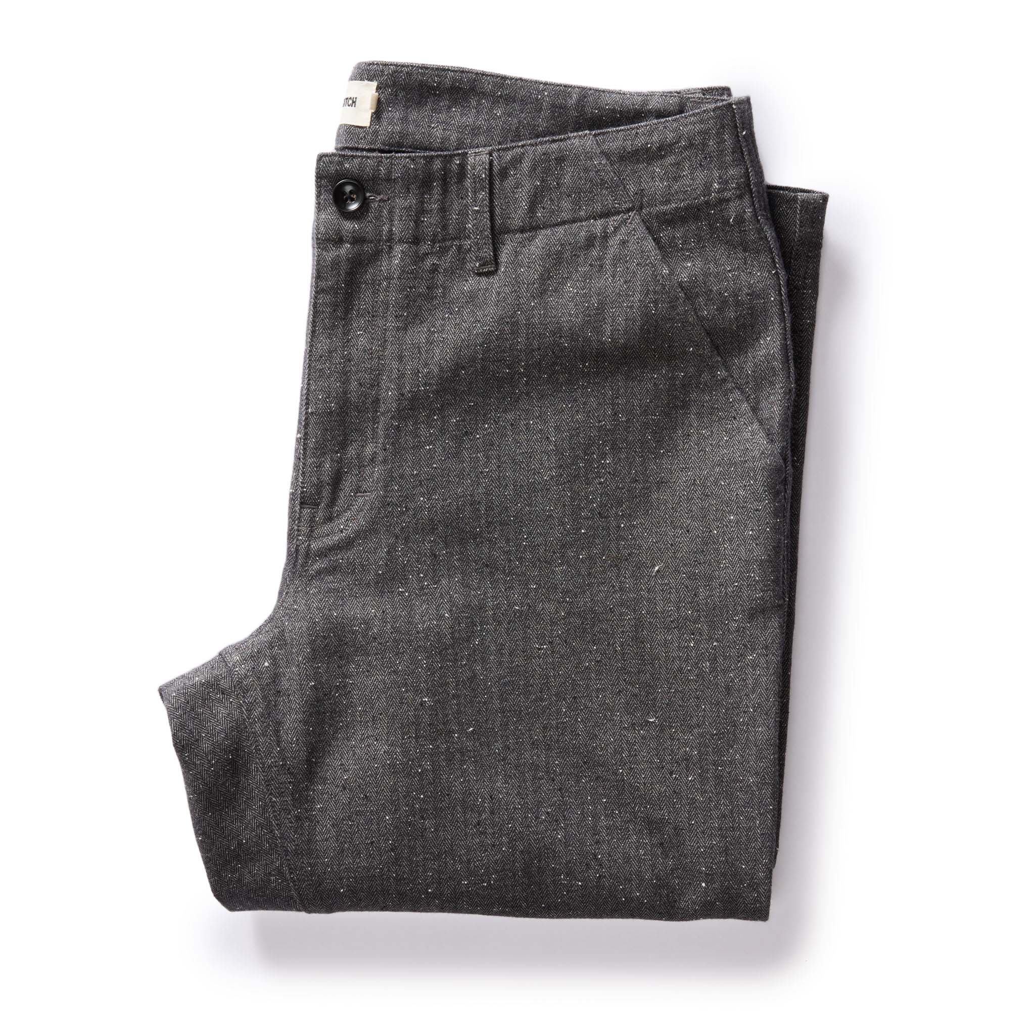 flatlay of The Carnegie Pant in Granite Herringbone, Bottoms by Taylor Stitch