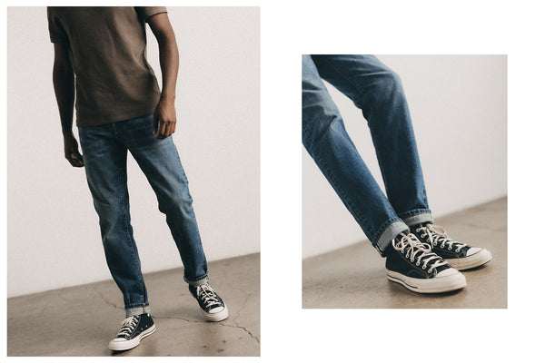 Model walking in The Straight Jean in Light Wash