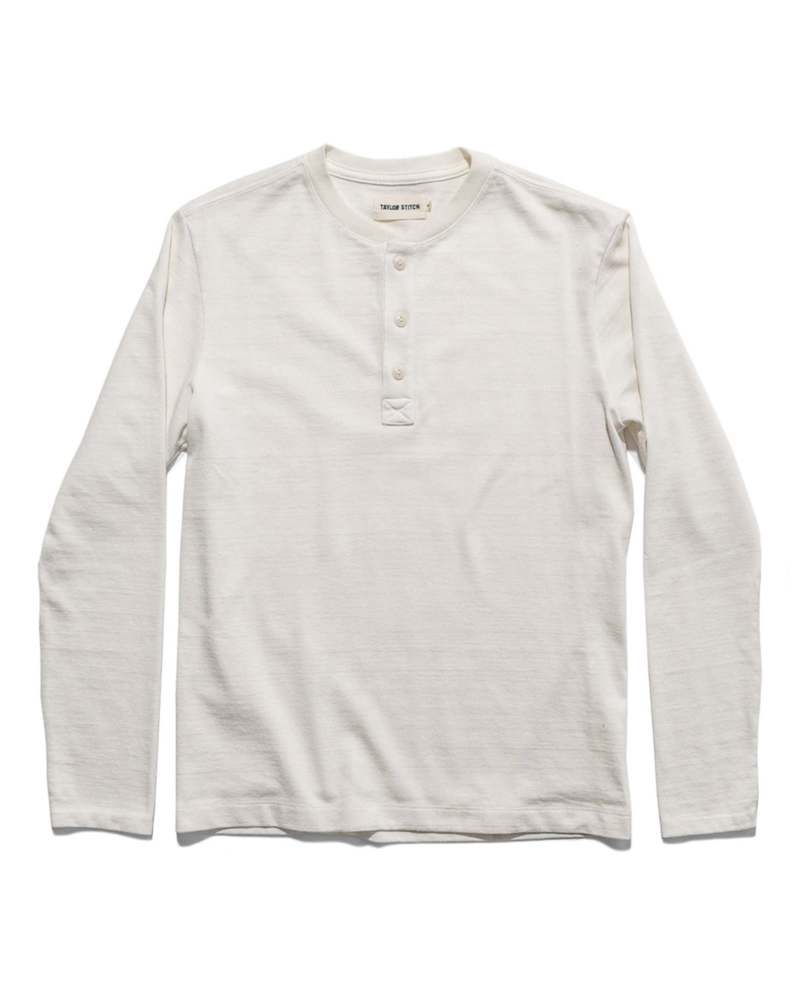 flatlay of The Heavy Bag Henley in Natural, Knits by Taylor Stitch