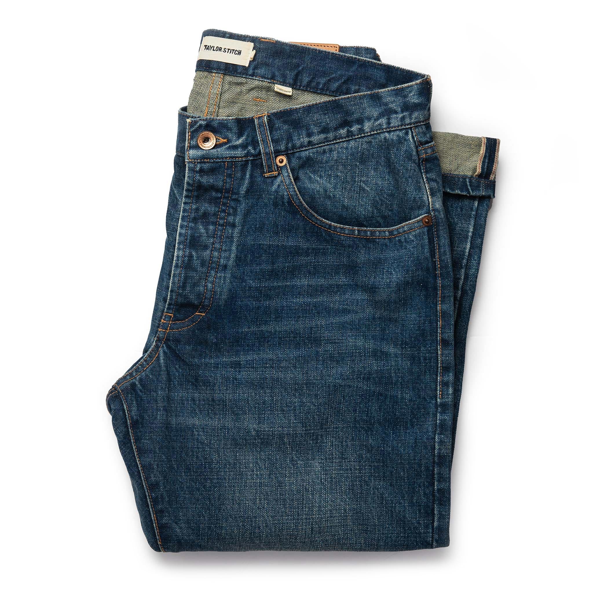 folded flatlay of The Democratic Jean in Sawyer Wash Organic Selvage, Bottoms by Taylor Stitch
