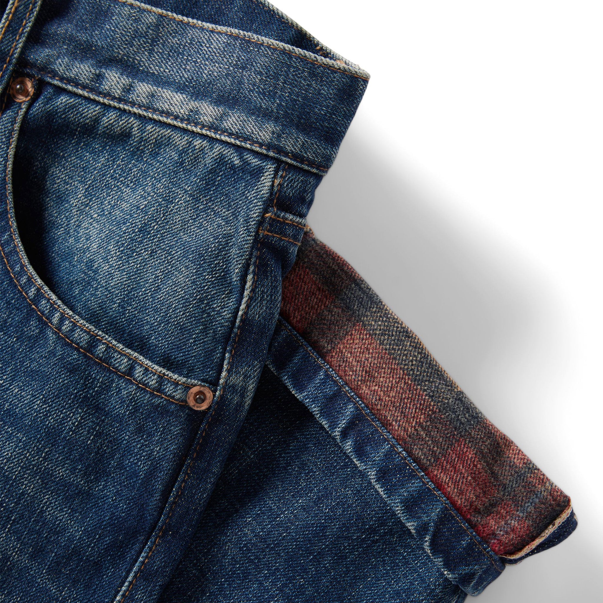 material shot of selvage cuff detailing on The Democratic Brushed Back Jean in Sawyer Wash Organic Selvage, Bottoms by Taylor Stitch