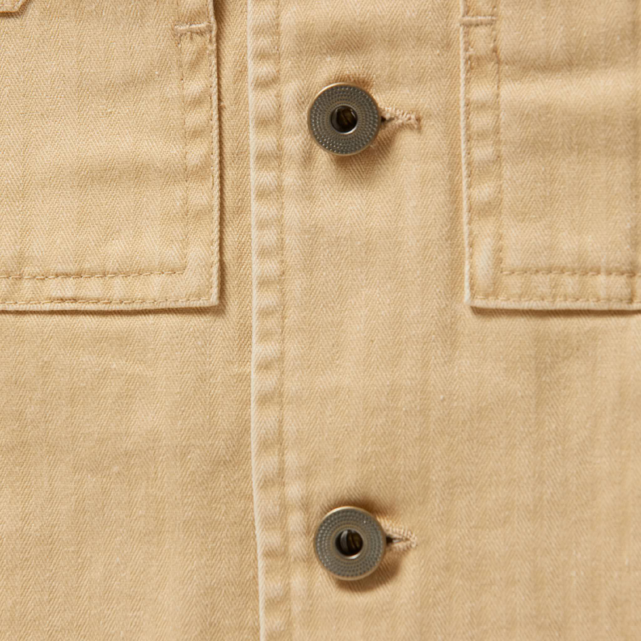 material shot of the placket of The Reserve Shirt in Khaki Herringbone, Outerwear by Taylor Stitch