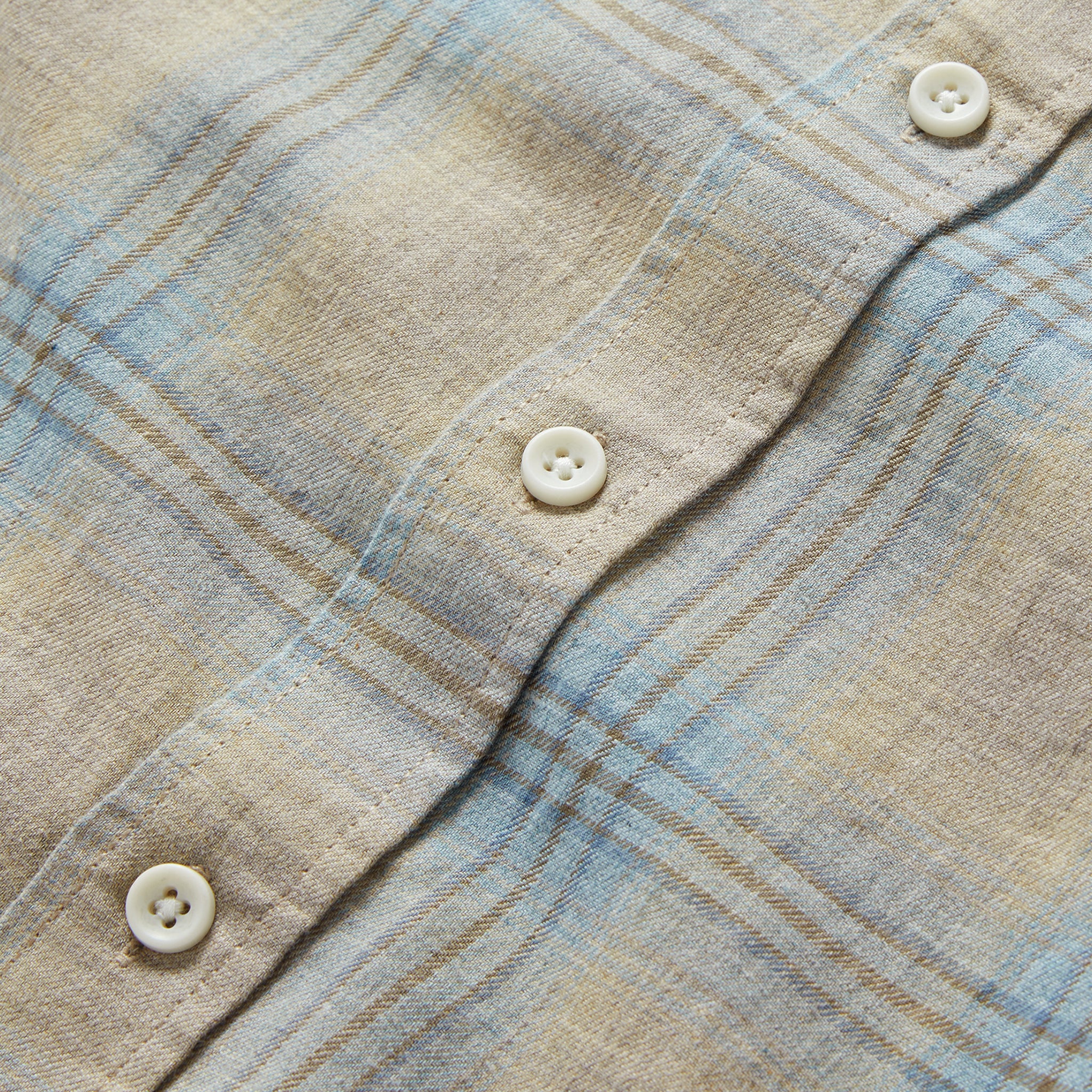 material shot of the buttons on The California Heathered Sky Plaid, Wovens by Taylor Stitch