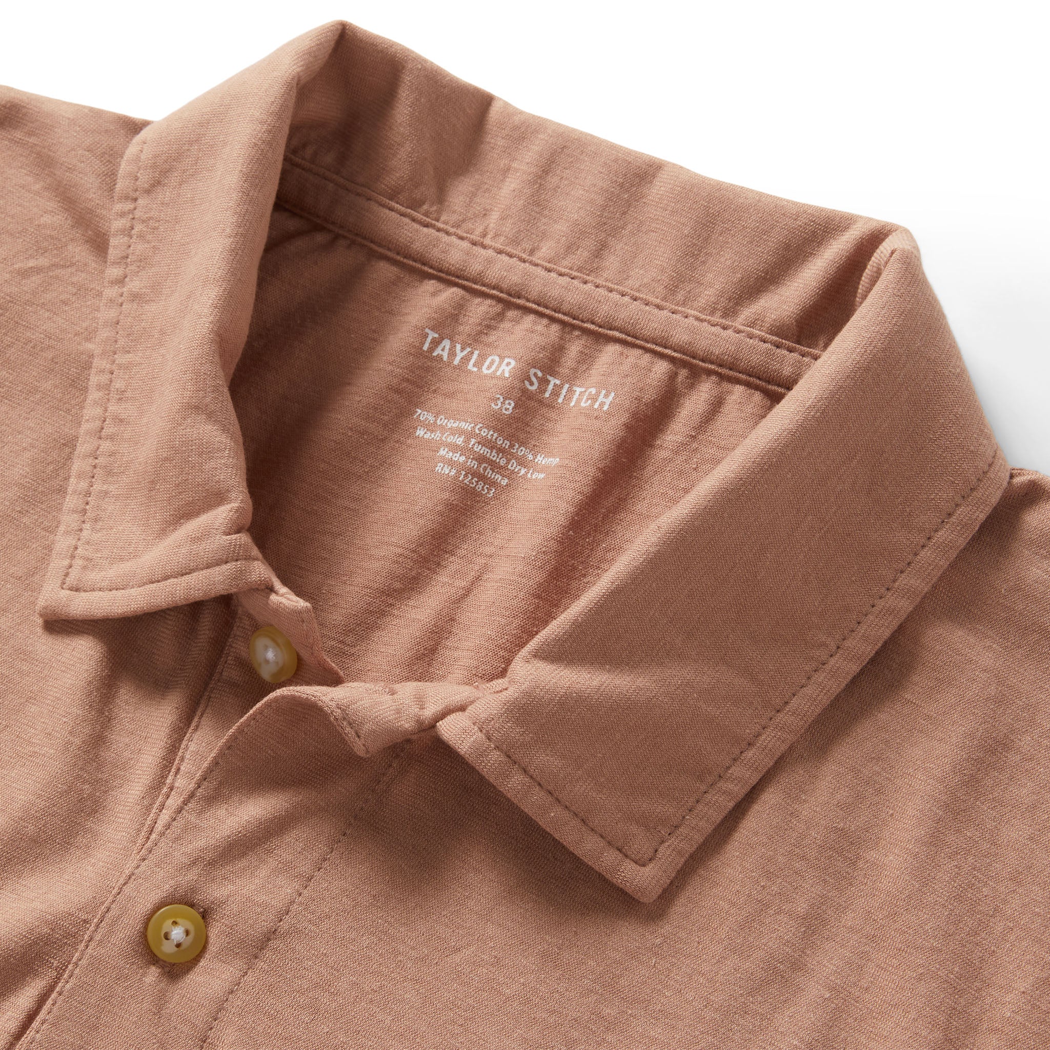 material shot of the collar on The Cotton Hemp Polo in Dried Acorn, Knits by Taylor Stitch
