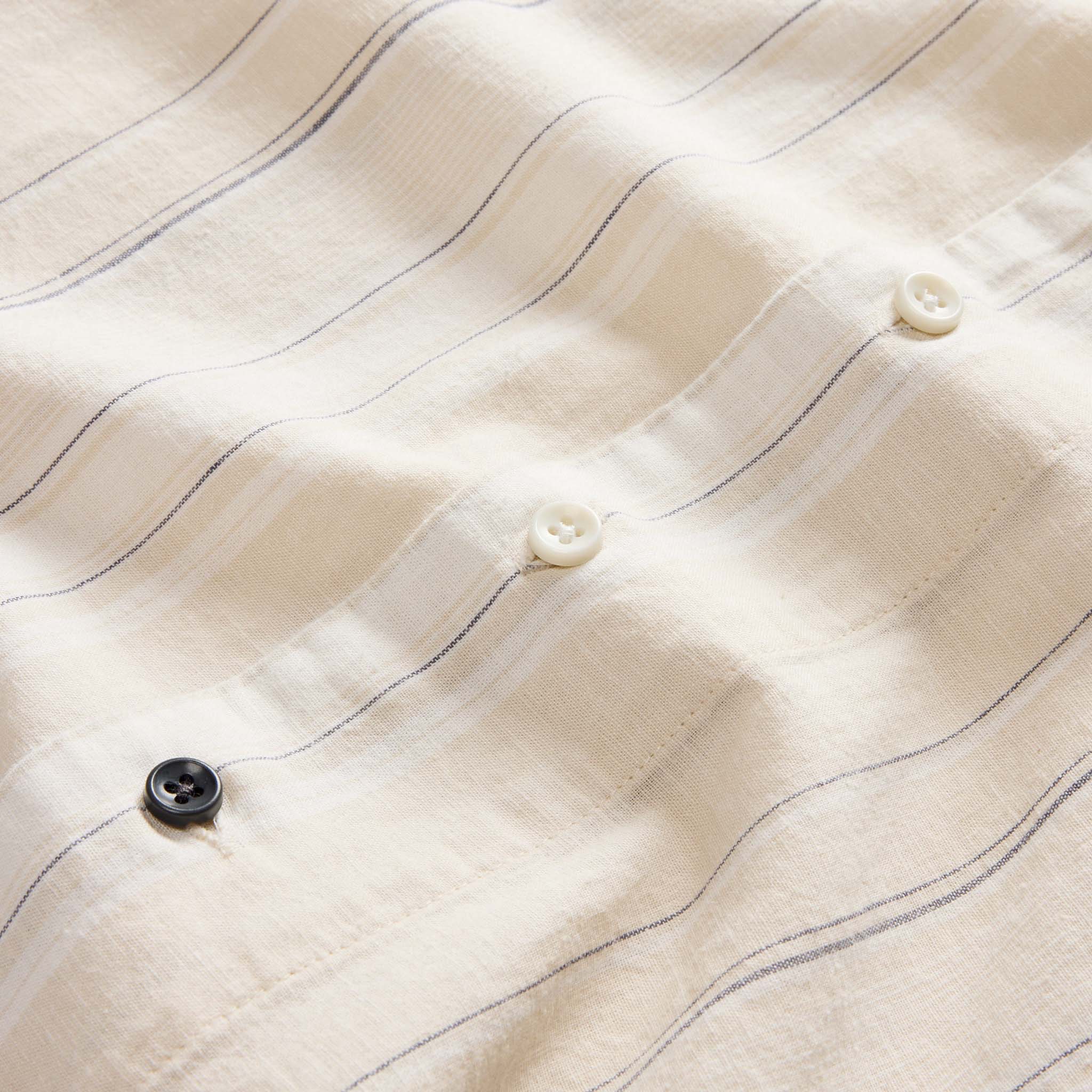 material shot of the buttons on The Short Sleeve Hawthorne in Fog Stripe, Wovens by Taylor Stitch