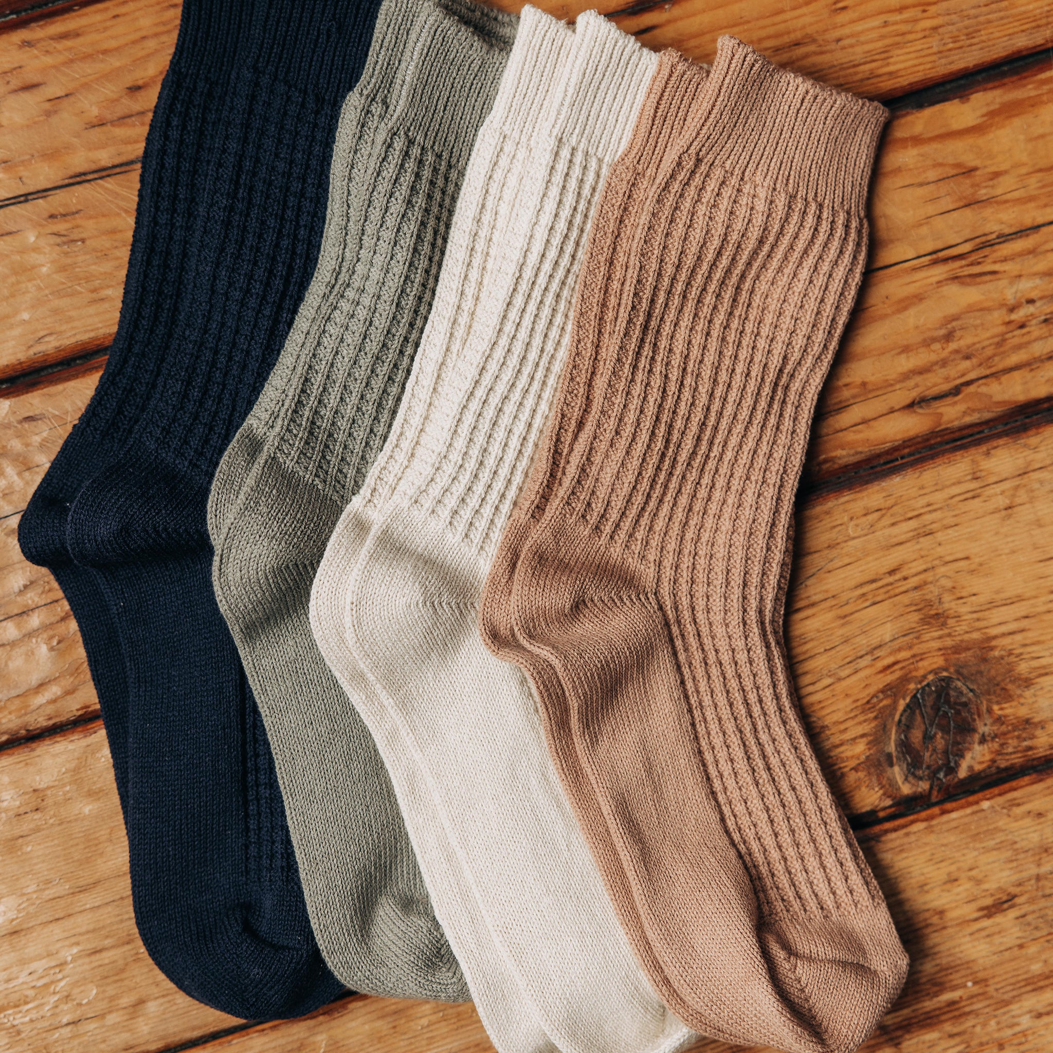 editorial image of socks laid out for The Waffle Sock in Navy, Accessories by Taylor Stitch
