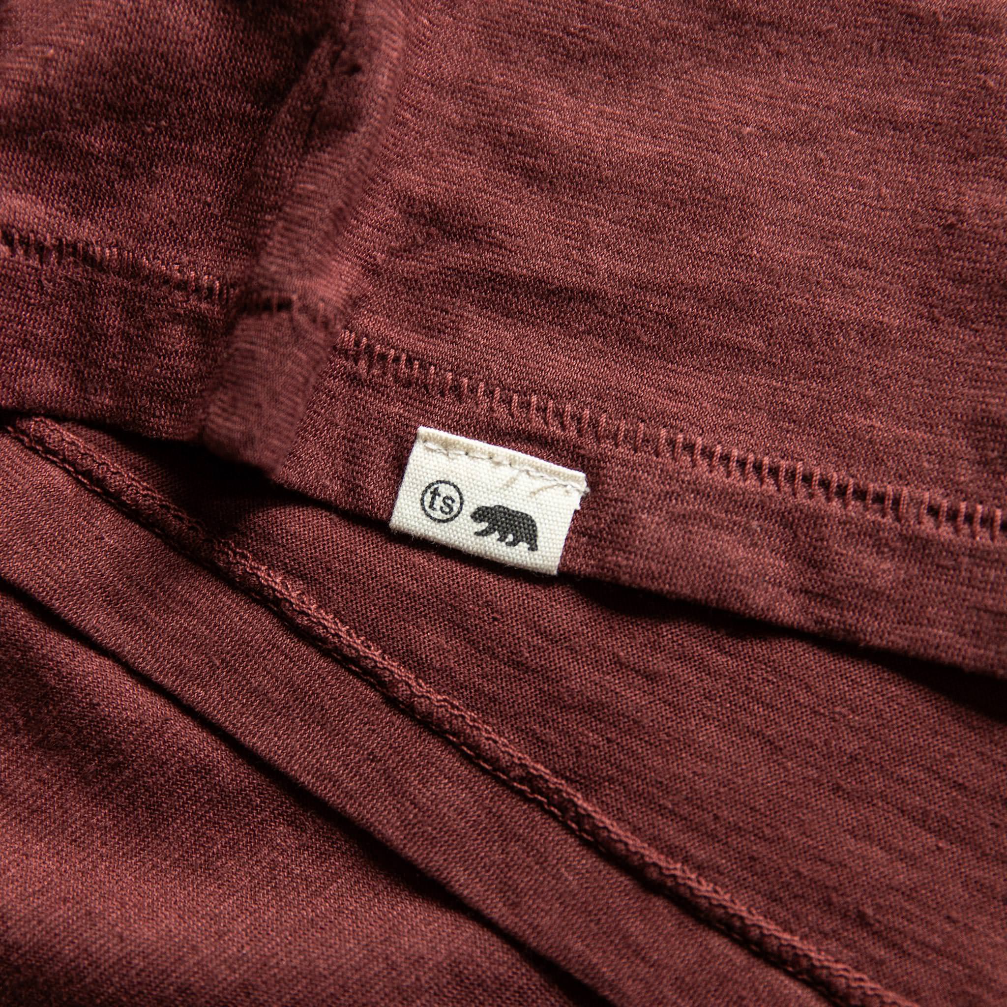 material shot of logo on bottom, Knits by Taylor Stitch