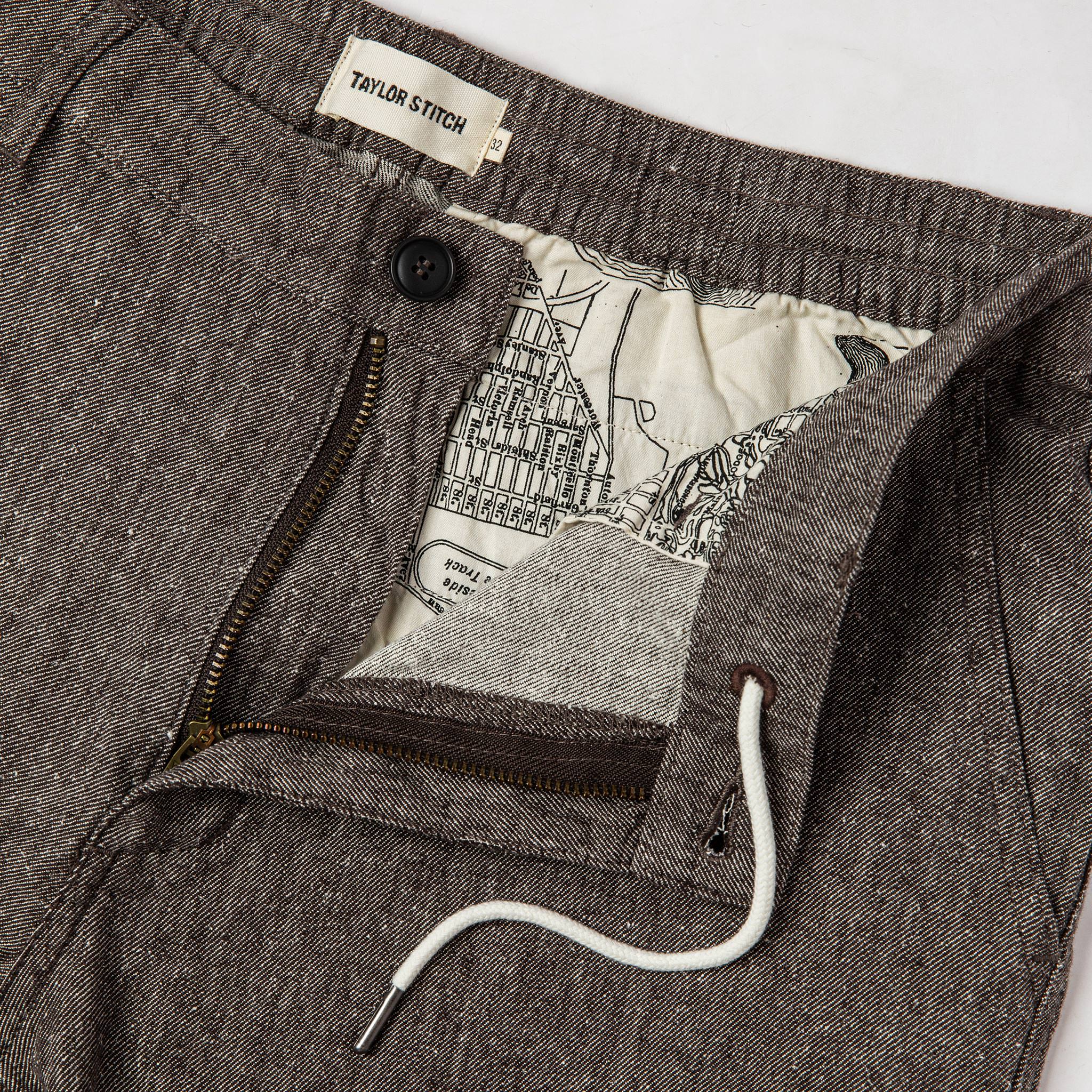 material shot of drawstring and map interior, Bottoms by Taylor Stitch