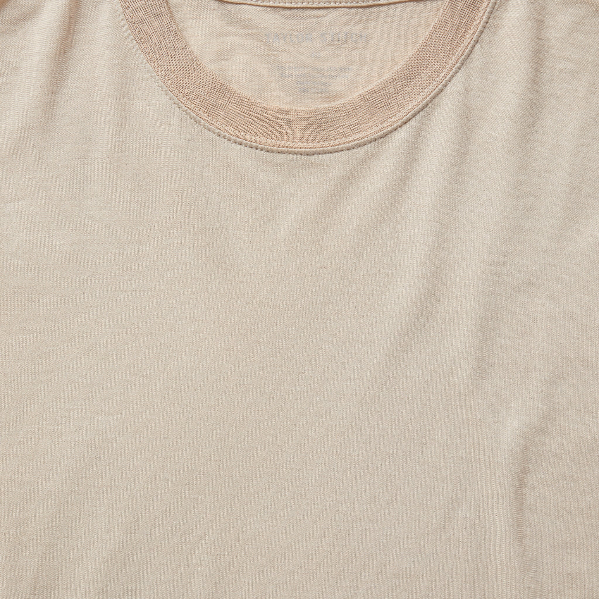 material shot of the collar on The Cotton Hemp Tee in Sand, Knits by Taylor Stitch