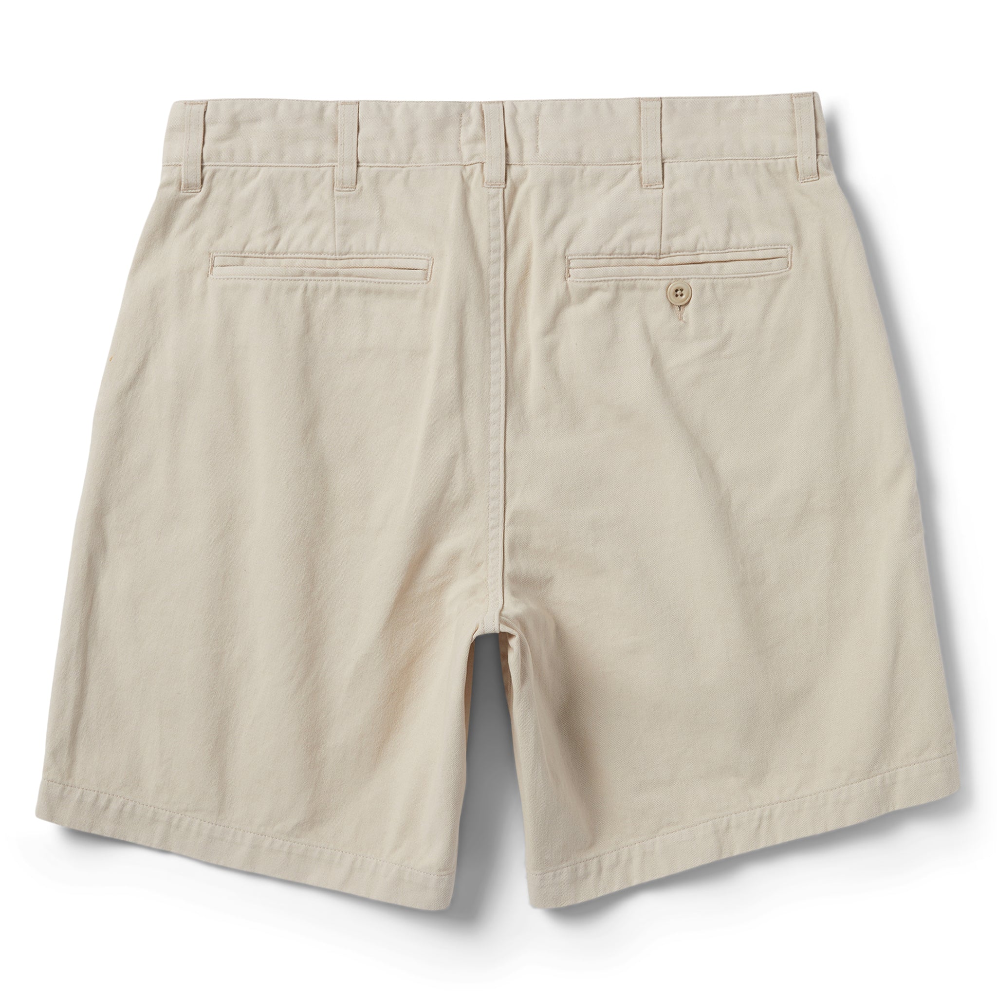 flatlay of The Foundation Short in Natural Twill, shown from the back, Bottoms by Taylor Stitch