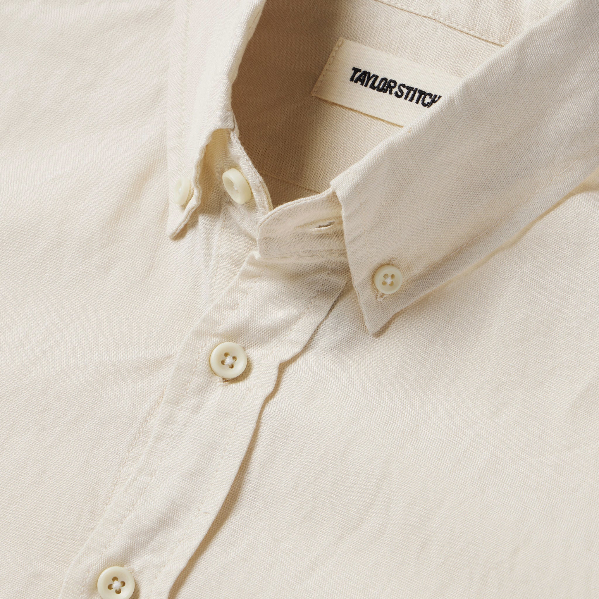 material shot of the collar on The Short Sleeve Jack in Natural and Espresso, Wovens by Taylor Stitch