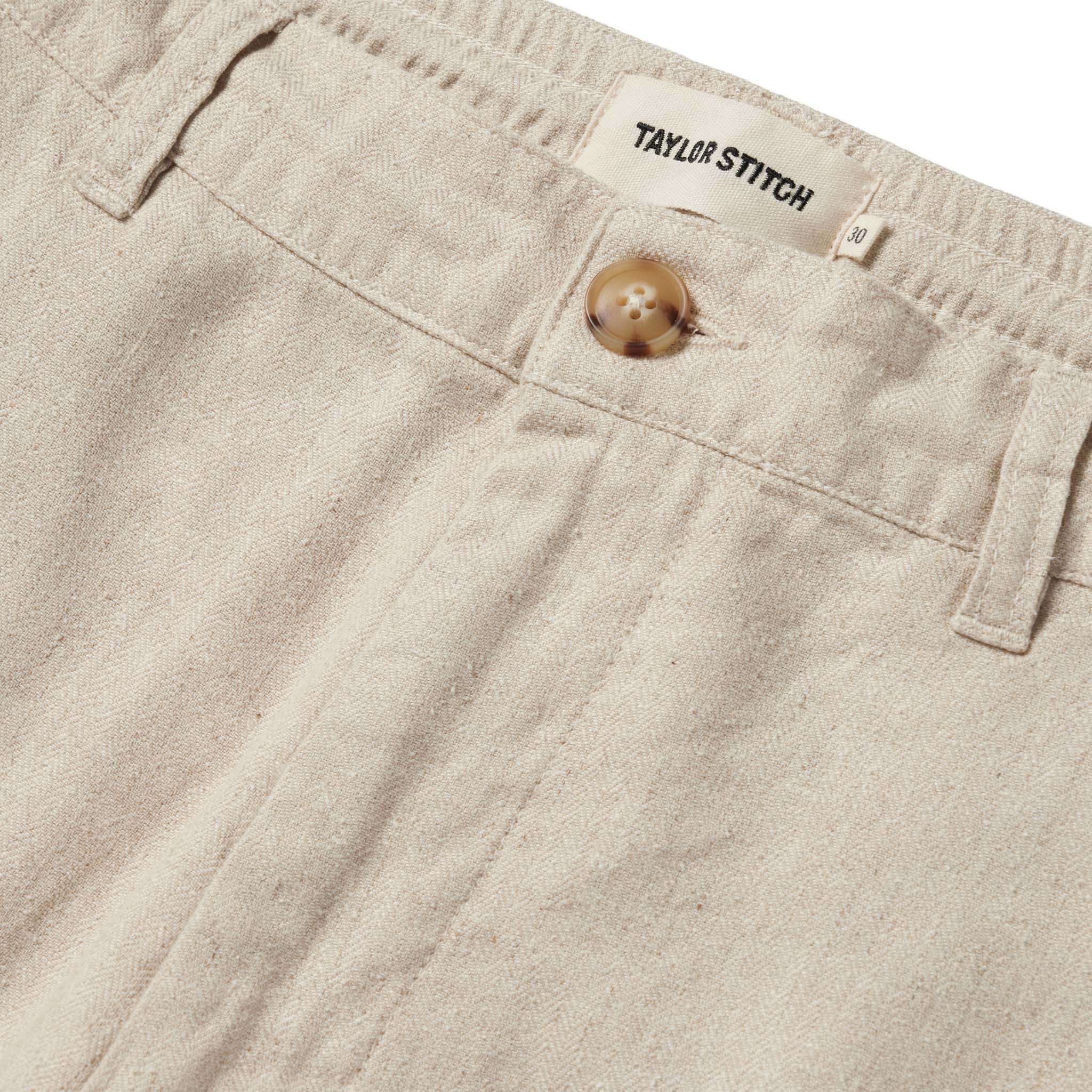 material shot of the button closure on The Easy Pant in Natural Herringbone, Bottoms by Taylor Stitch