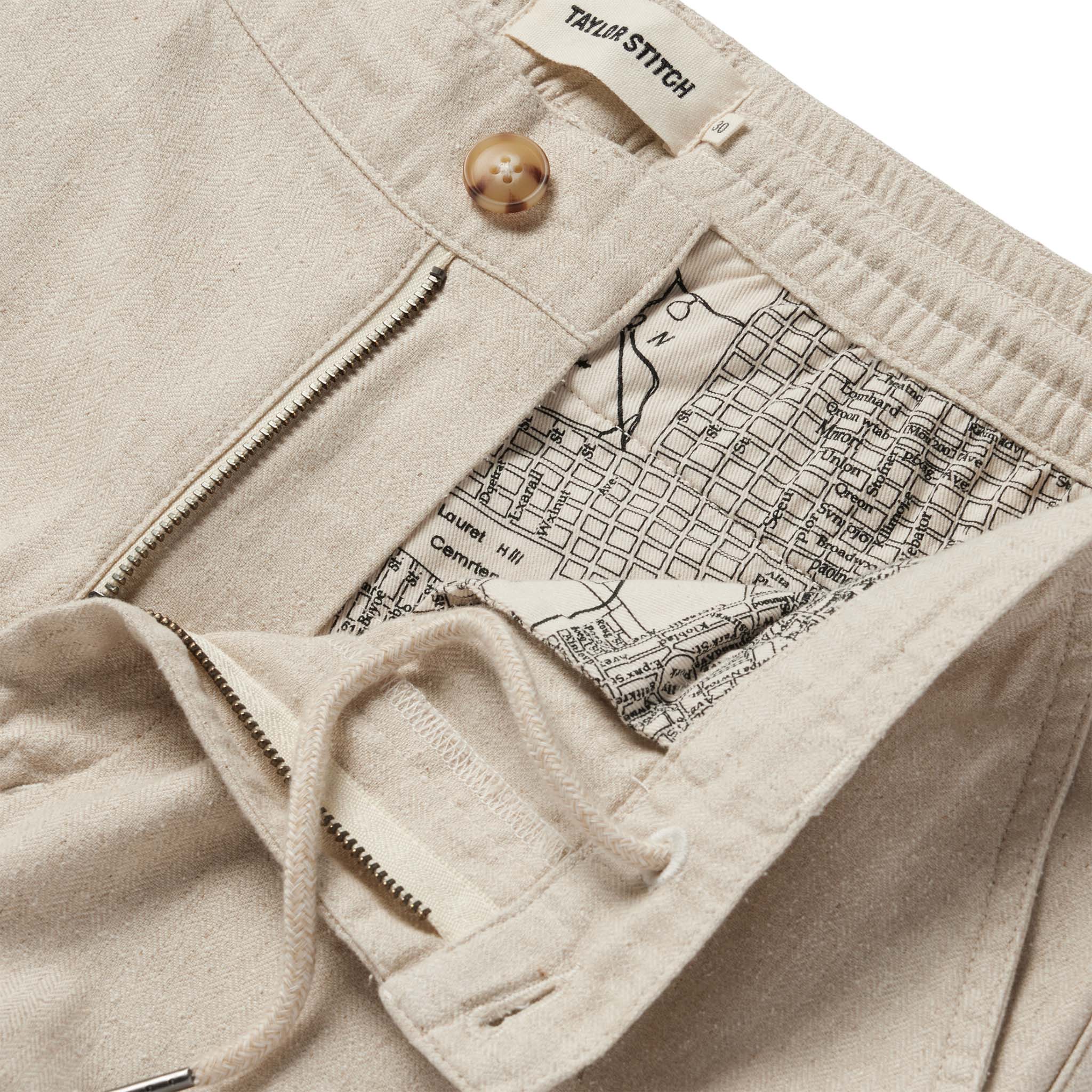 material shot of the SF map printing  and internal drawstring on The Easy Pant in Natural Herringbone, Bottoms by Taylor Stitch