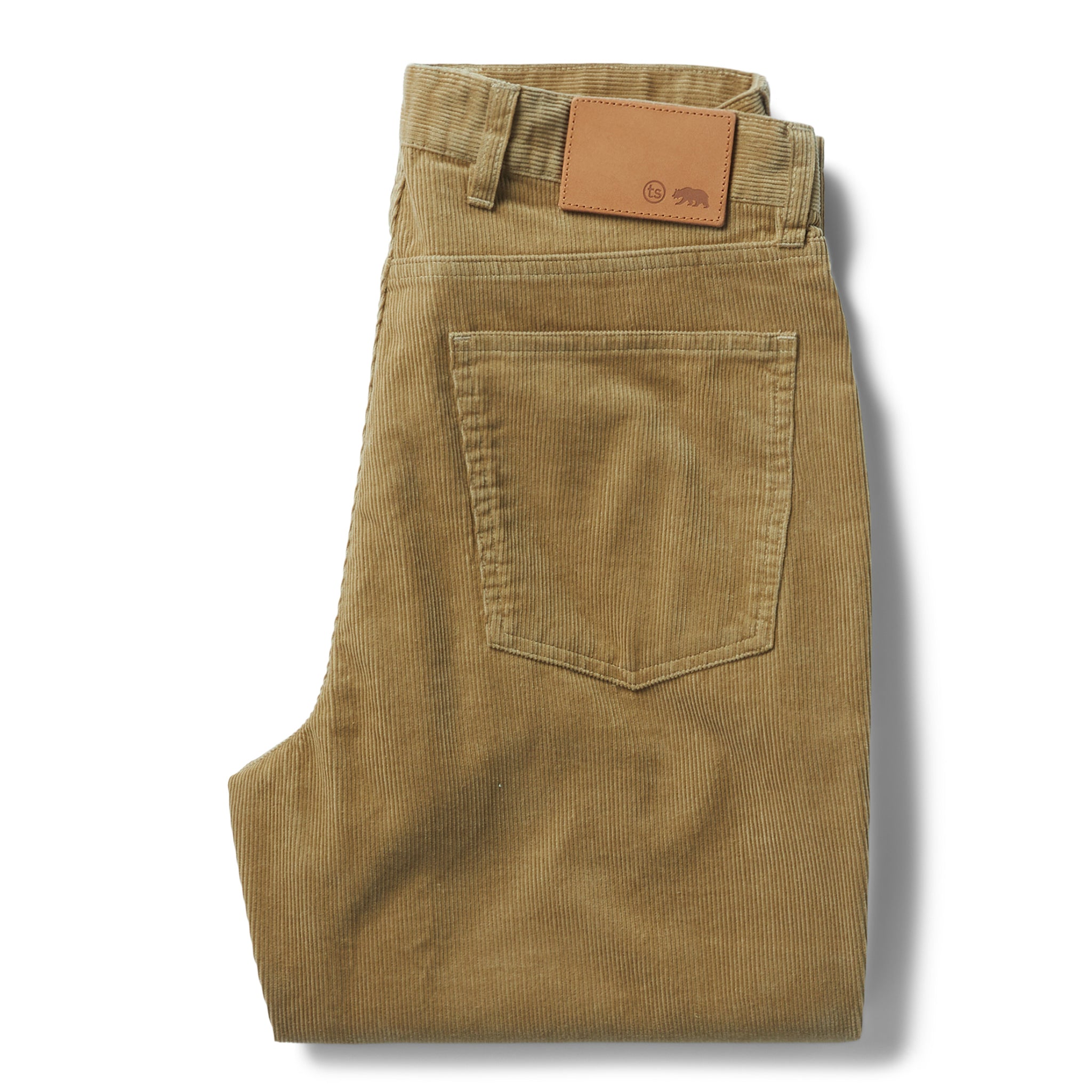 flatlay of The Democratic All Day Pant in Khaki Cord, shown folded from the back, Bottoms by Taylor Stitch