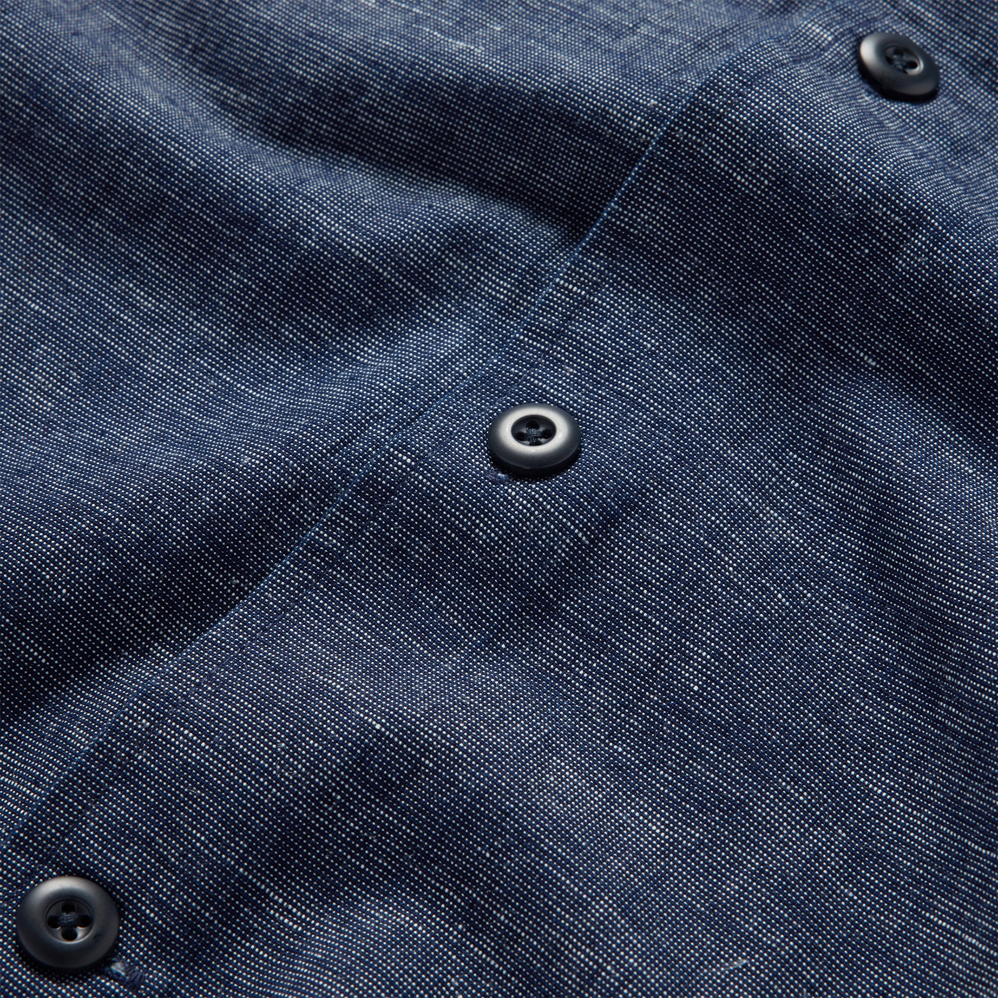 material shot of the buttons on The Point Shirt in Indigo Slub, Wovens by Taylor Stitch