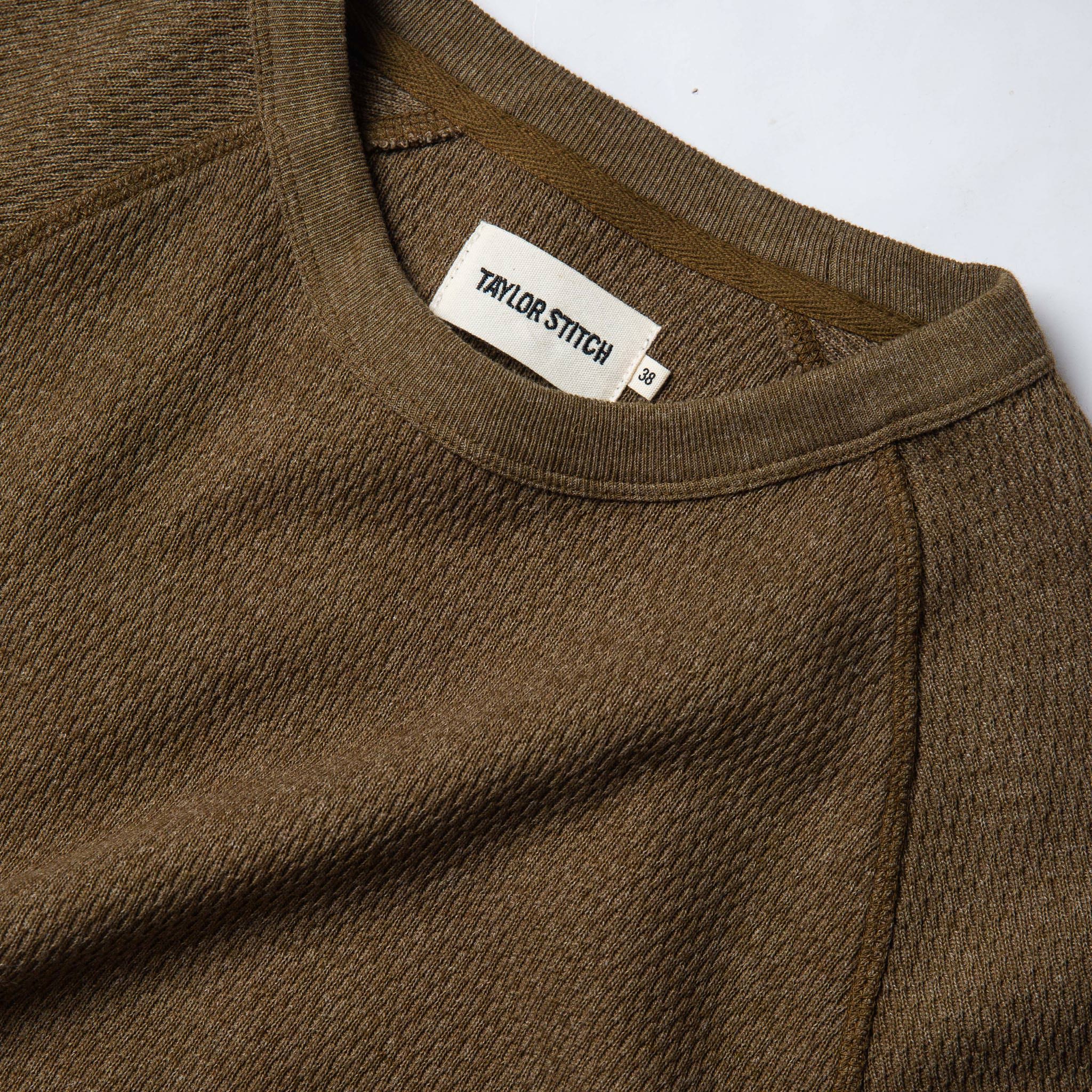 material shot of the label in The Heavy Bag Waffle Crewneck in Olive, Knits by Taylor Stitch