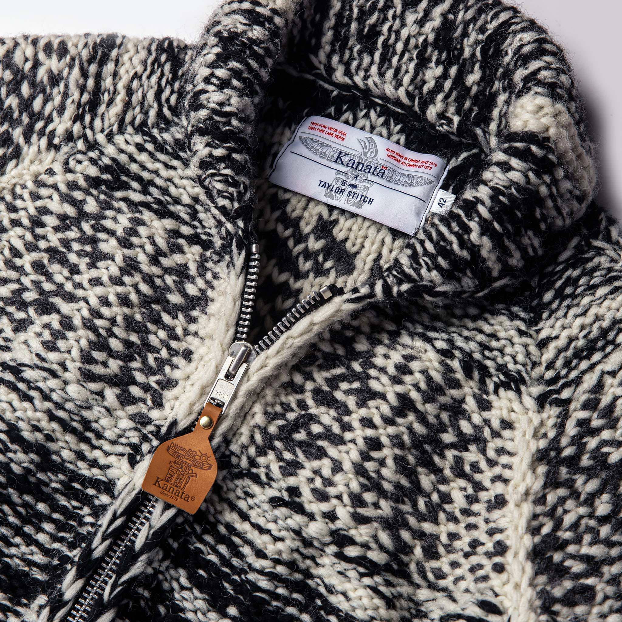 material shot of The Seawall Hand-knit Sweater showing the interior collaboration label, Knits by Taylor Stitch