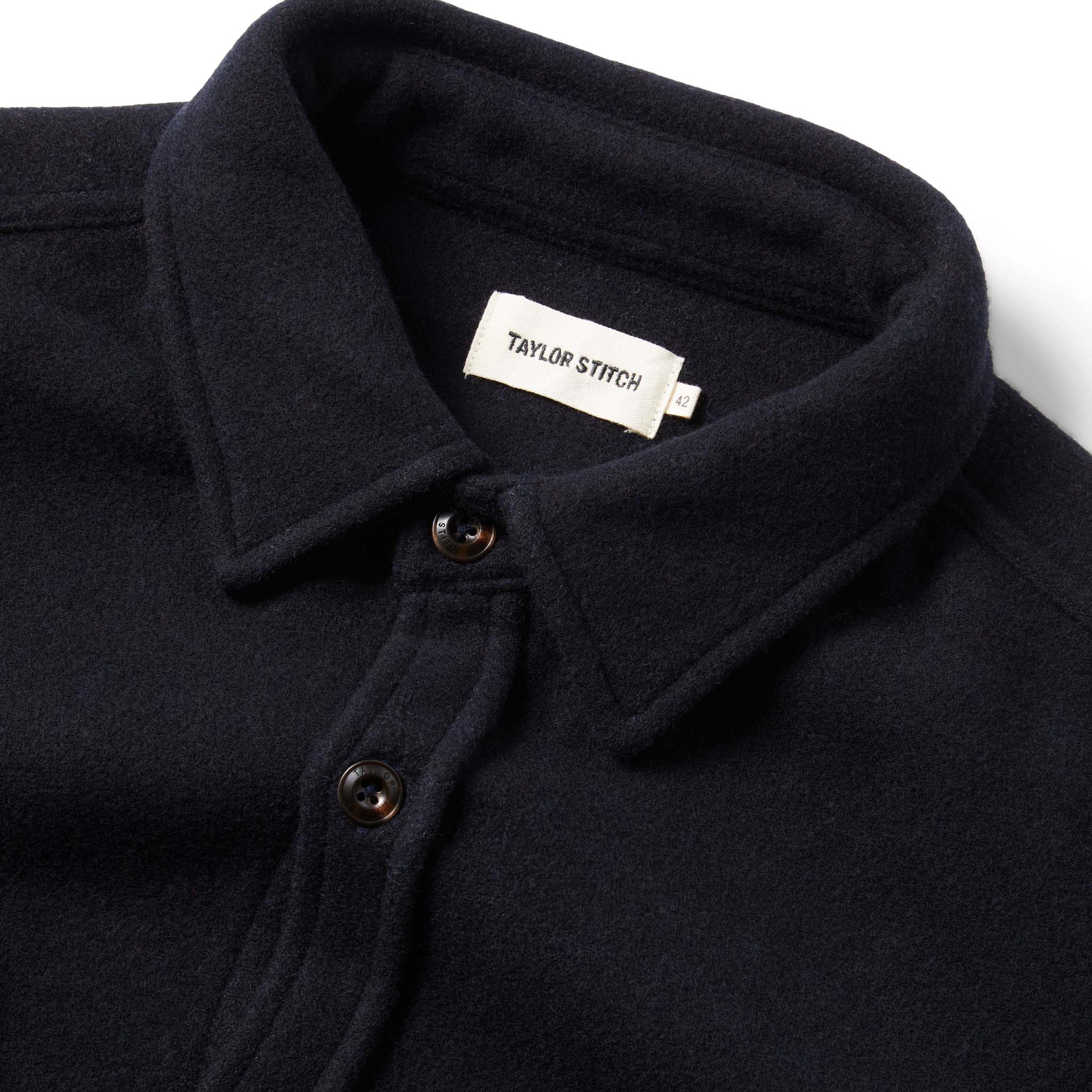 material shot of The Maritime Shirt in Navy Wool showing interior label, Wovens by Taylor Stitch