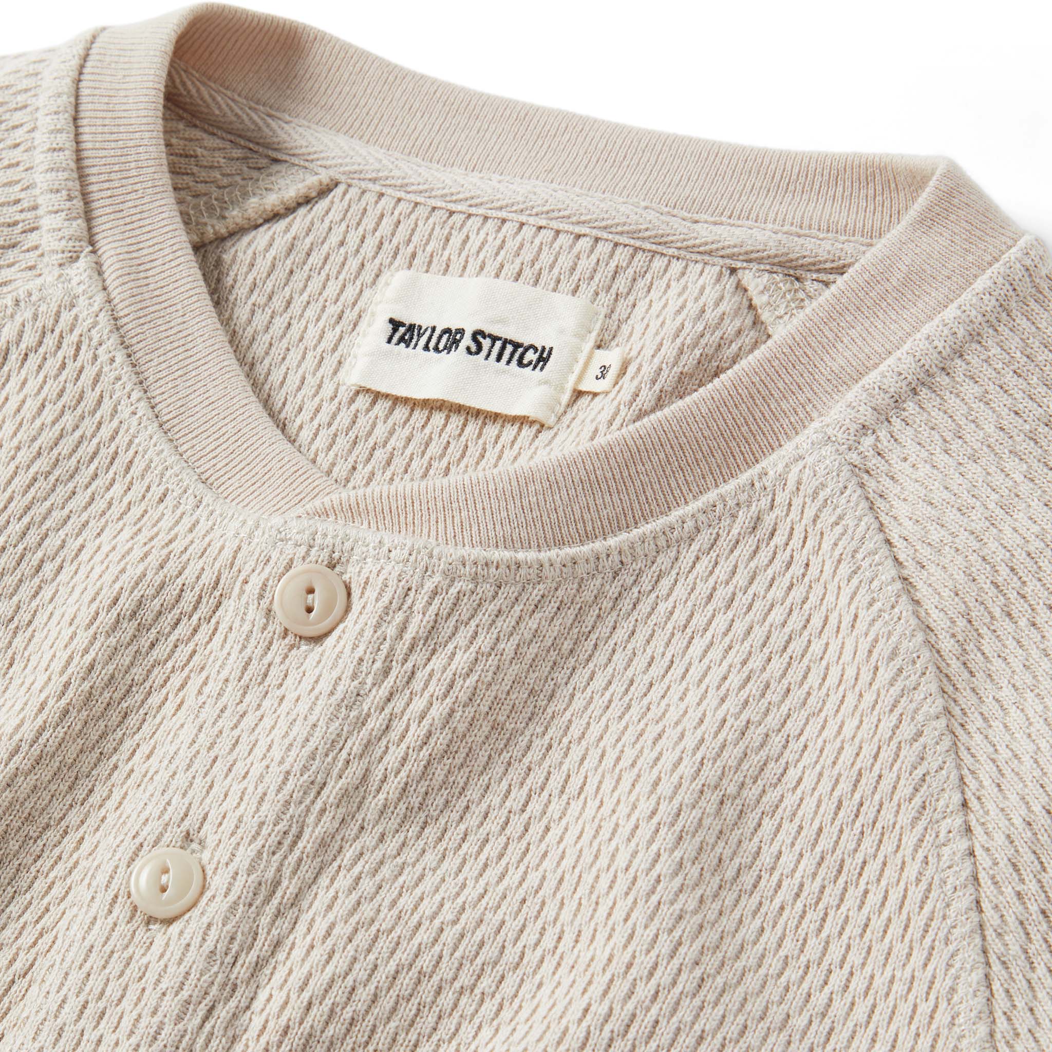 material shot of the collar on The Heavy Bag Waffle Henley in Oatmeal, Knits by Taylor Stitch