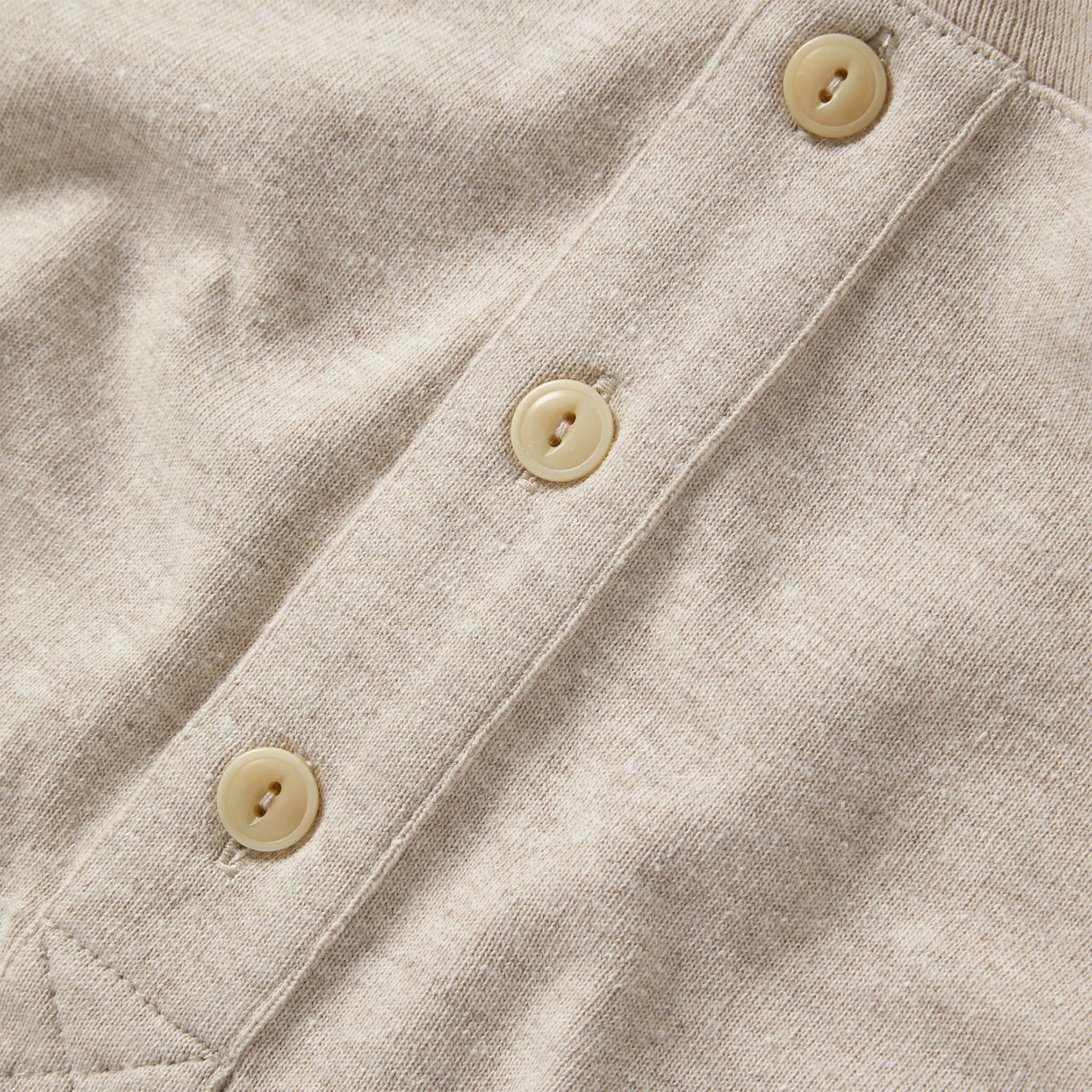 material shot of hte buttons on The Heavy Bag Henley in Oatmeal, Knits by Taylor Stitch
