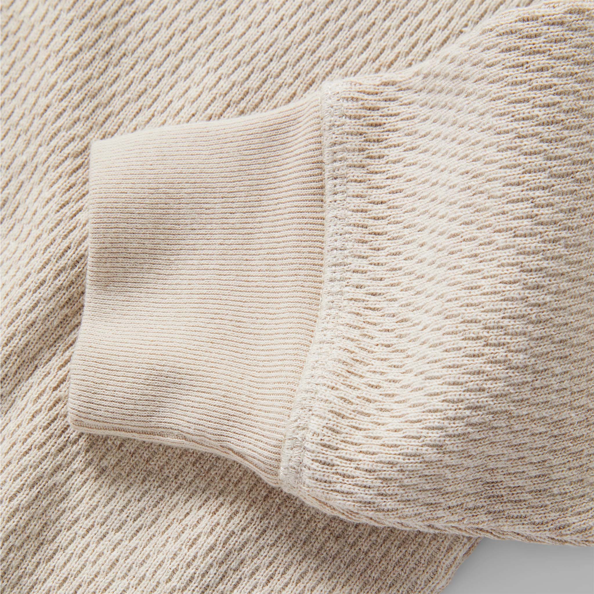 material shot of the sleeves on The Heavy Bag Waffle Henley in Oatmeal, Knits by Taylor Stitch