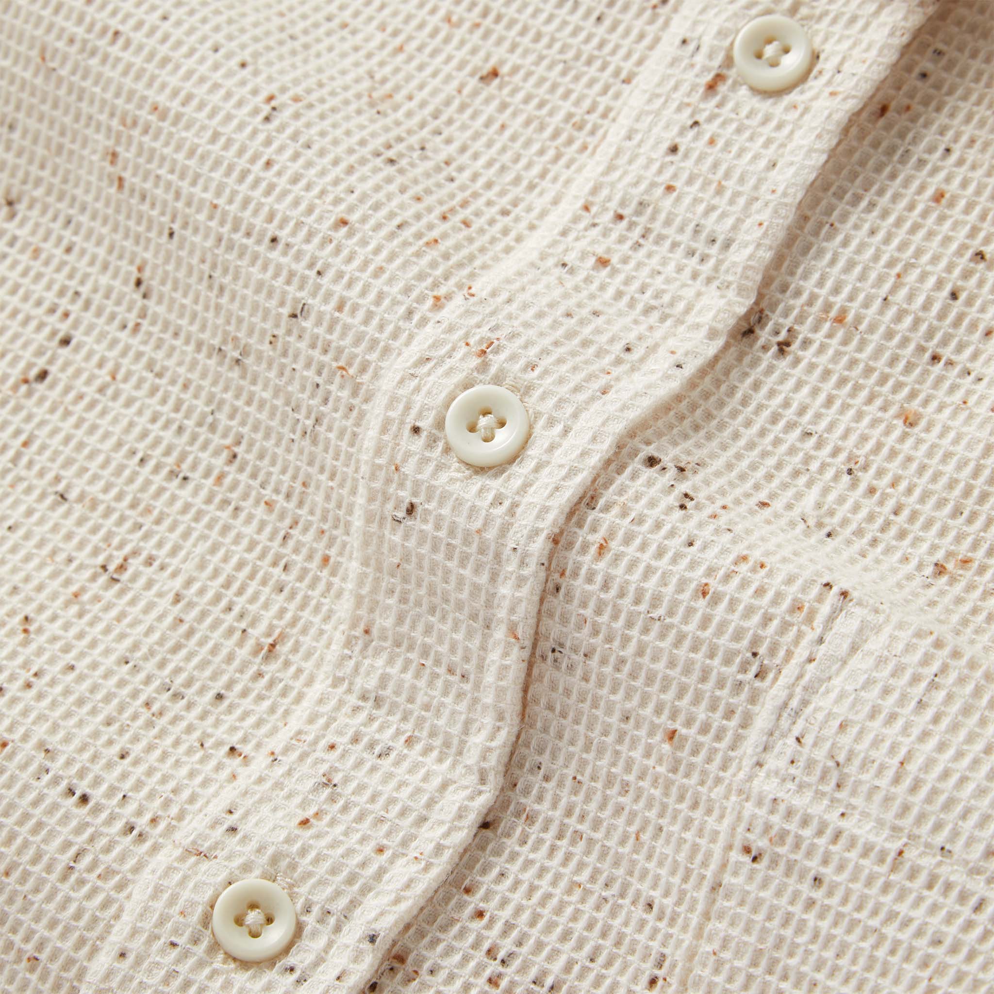 material shot of the buttons on The Jack in Natural Jaspe Waffle, Wovens by Taylor Stitch
