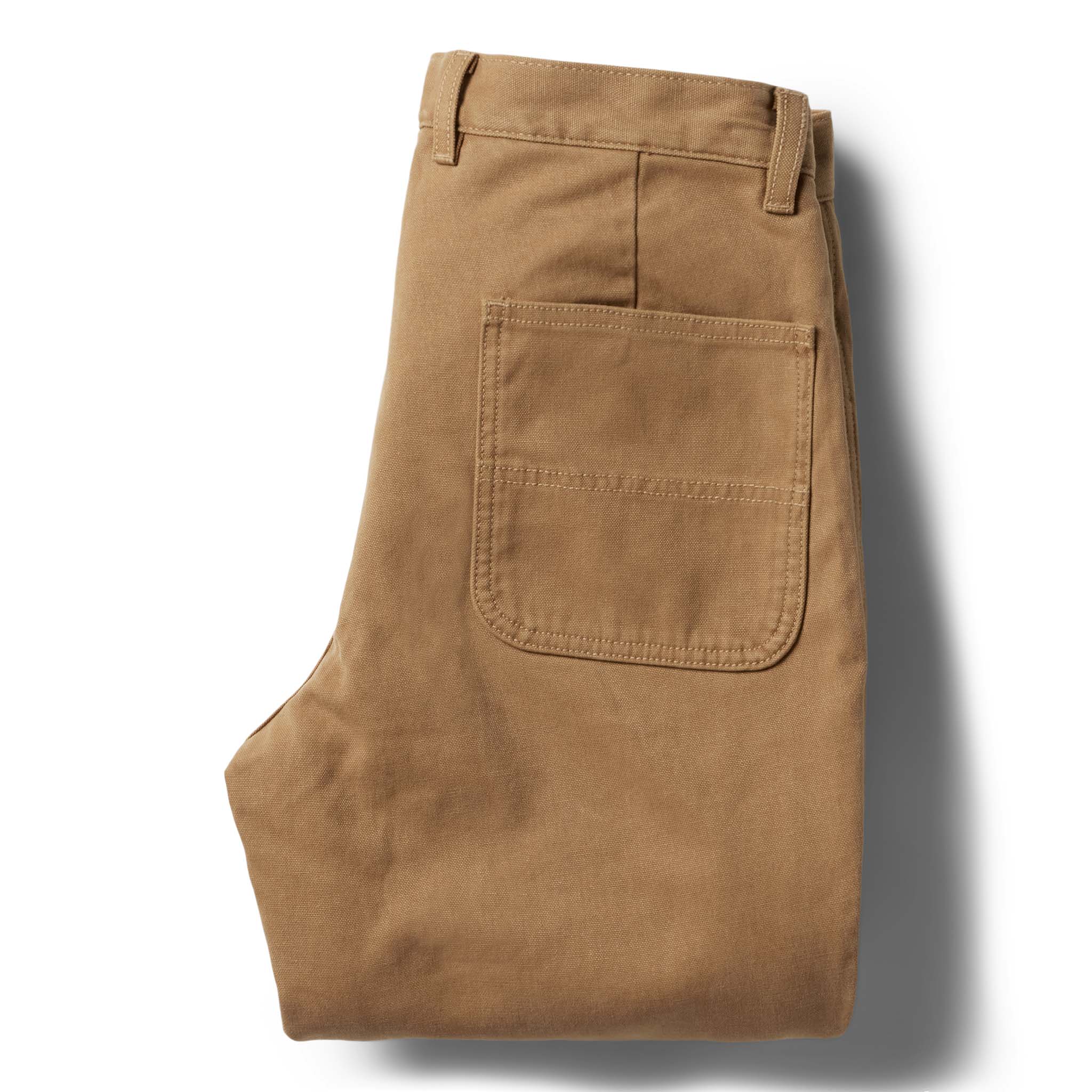 flatlay of the back of The Lined Chore Pant in Tobacco Boss Duck folded, Bottoms by Taylor Stitch