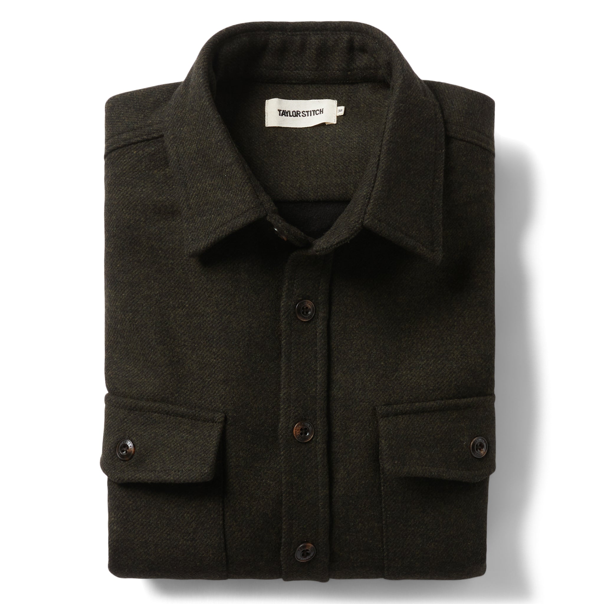 flatlay of The Maritime Shirt Jacket in Evergreen Twill folded, Wovens by Taylor Stitch