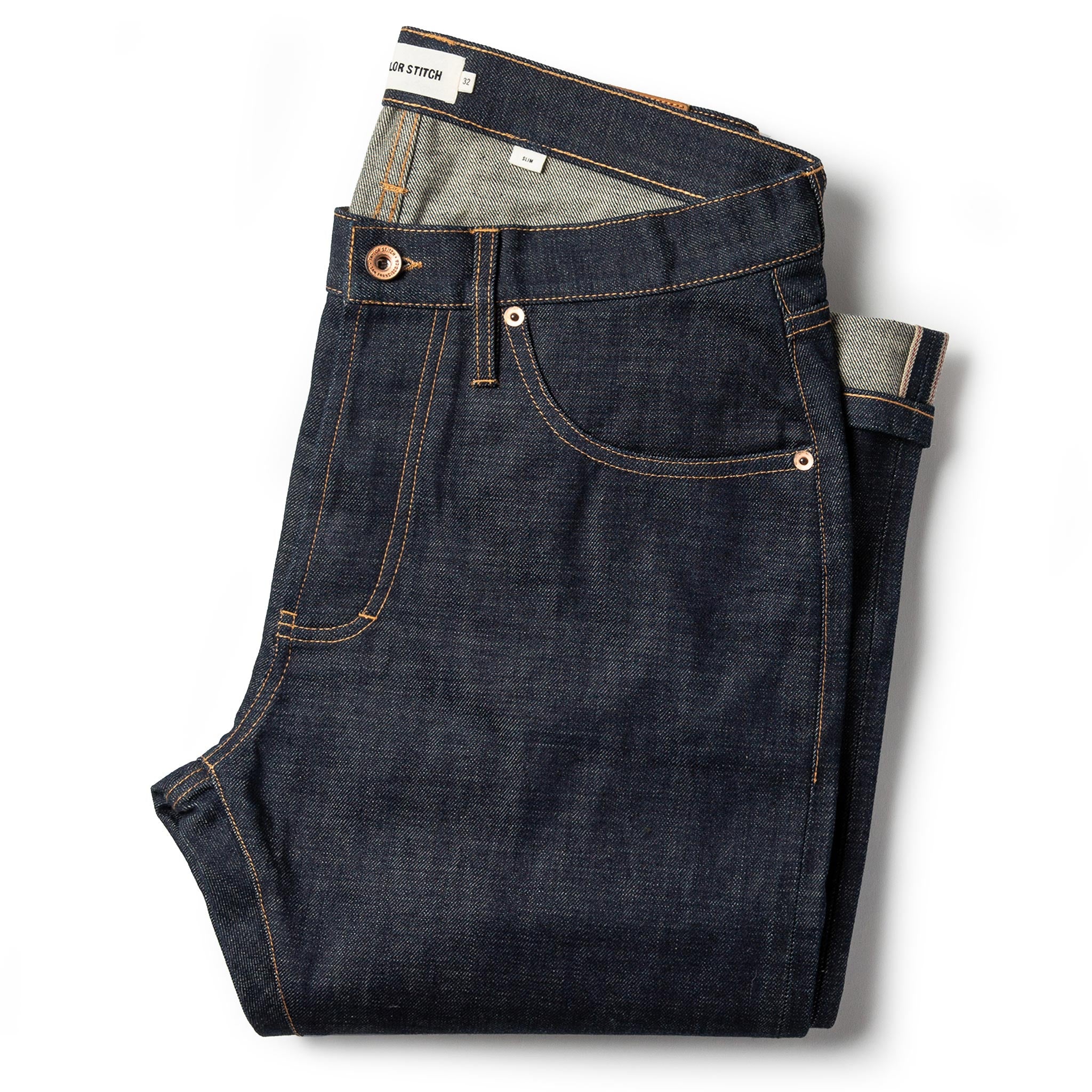 folded flatlay of The Slim Jean in Organic Selvage, Bottoms by Taylor Stitch