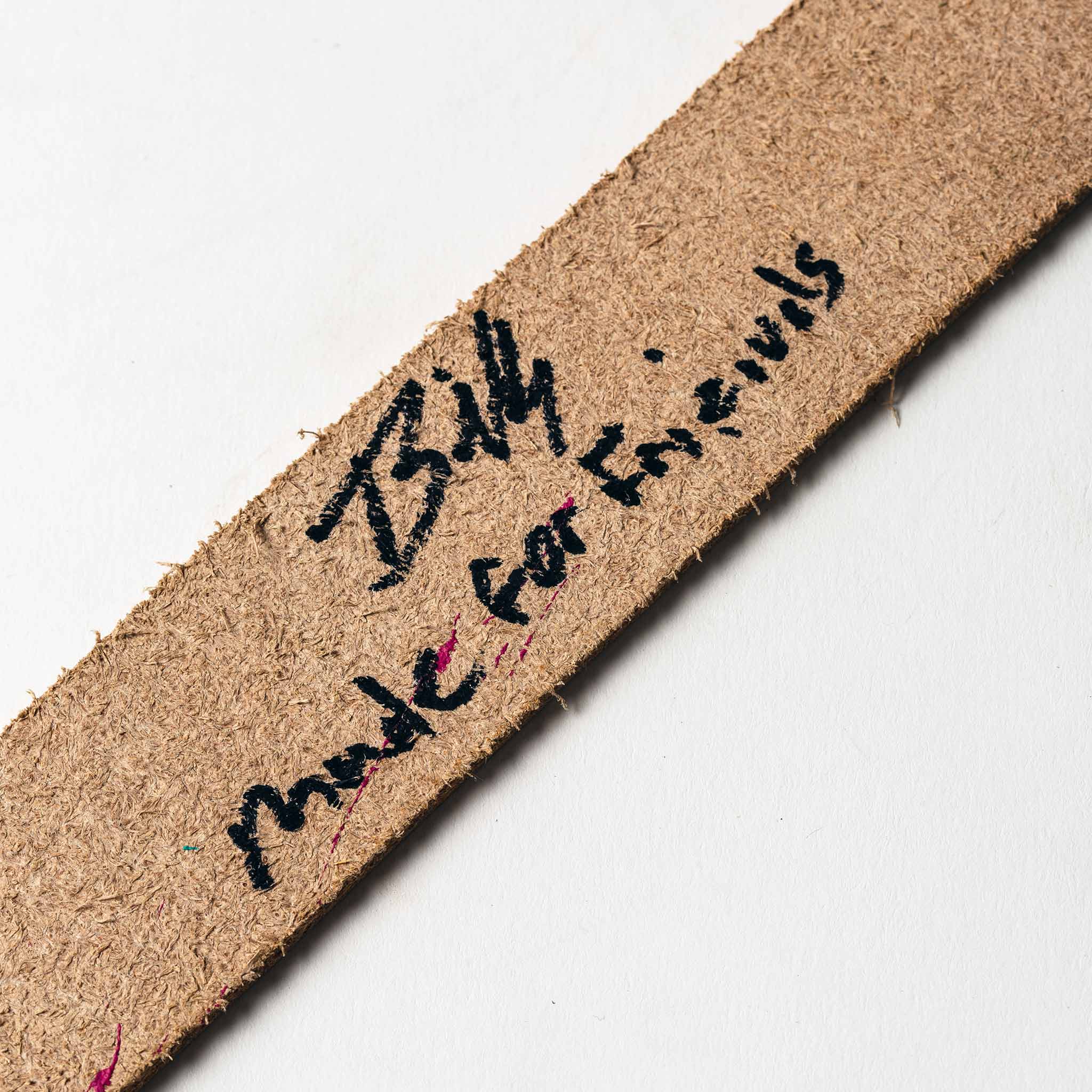 signed material shot of The Stitched Belt in Jungle Stripe, Accessories by Taylor Stitch