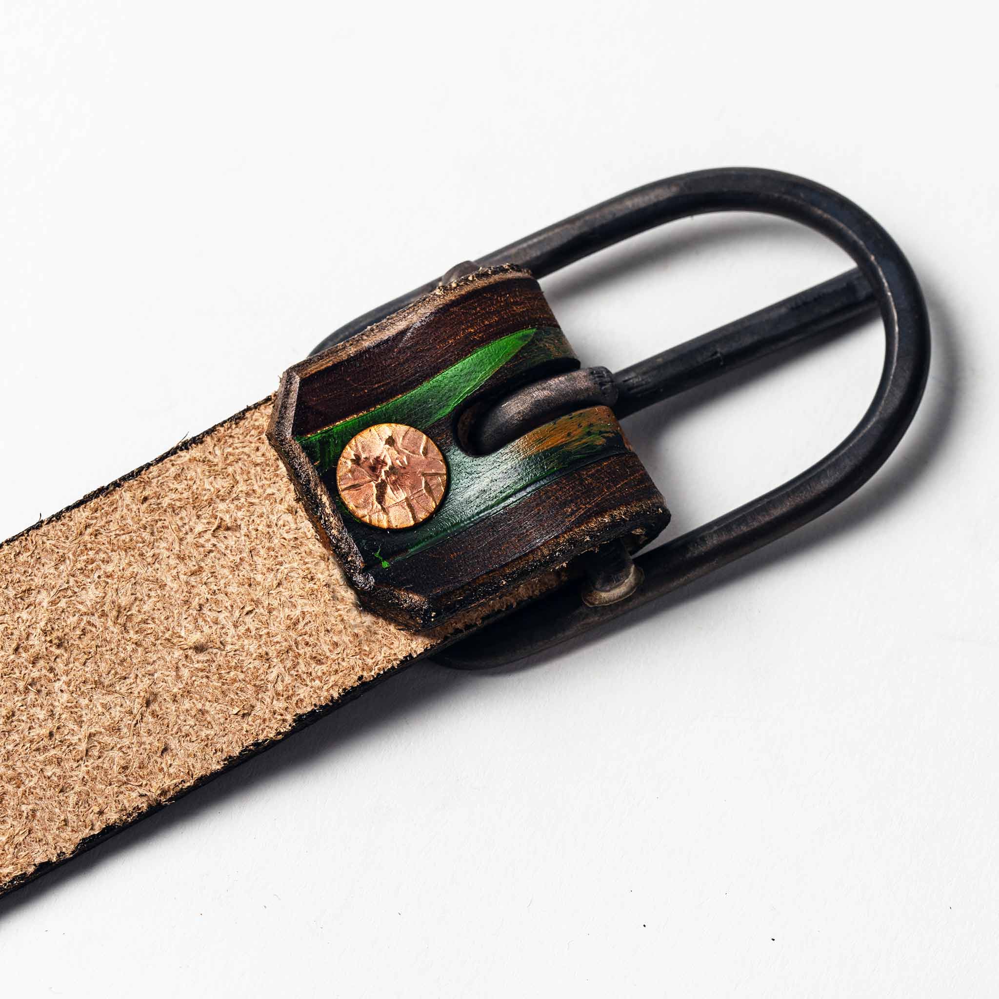 studio shot of the buckle on The Stitched Belt in Jungle Stripe, Accessories by Taylor Stitch