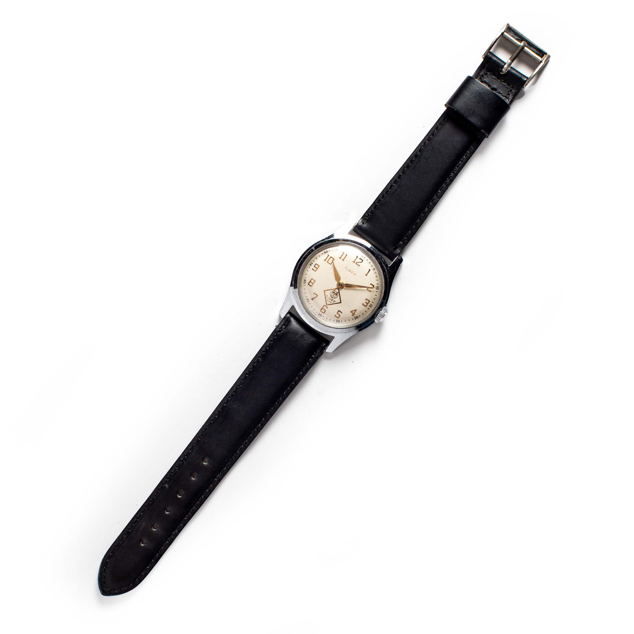 flatlay of the 1957 Timex Marlin Cub Scout, Accessories by Taylor Stitch