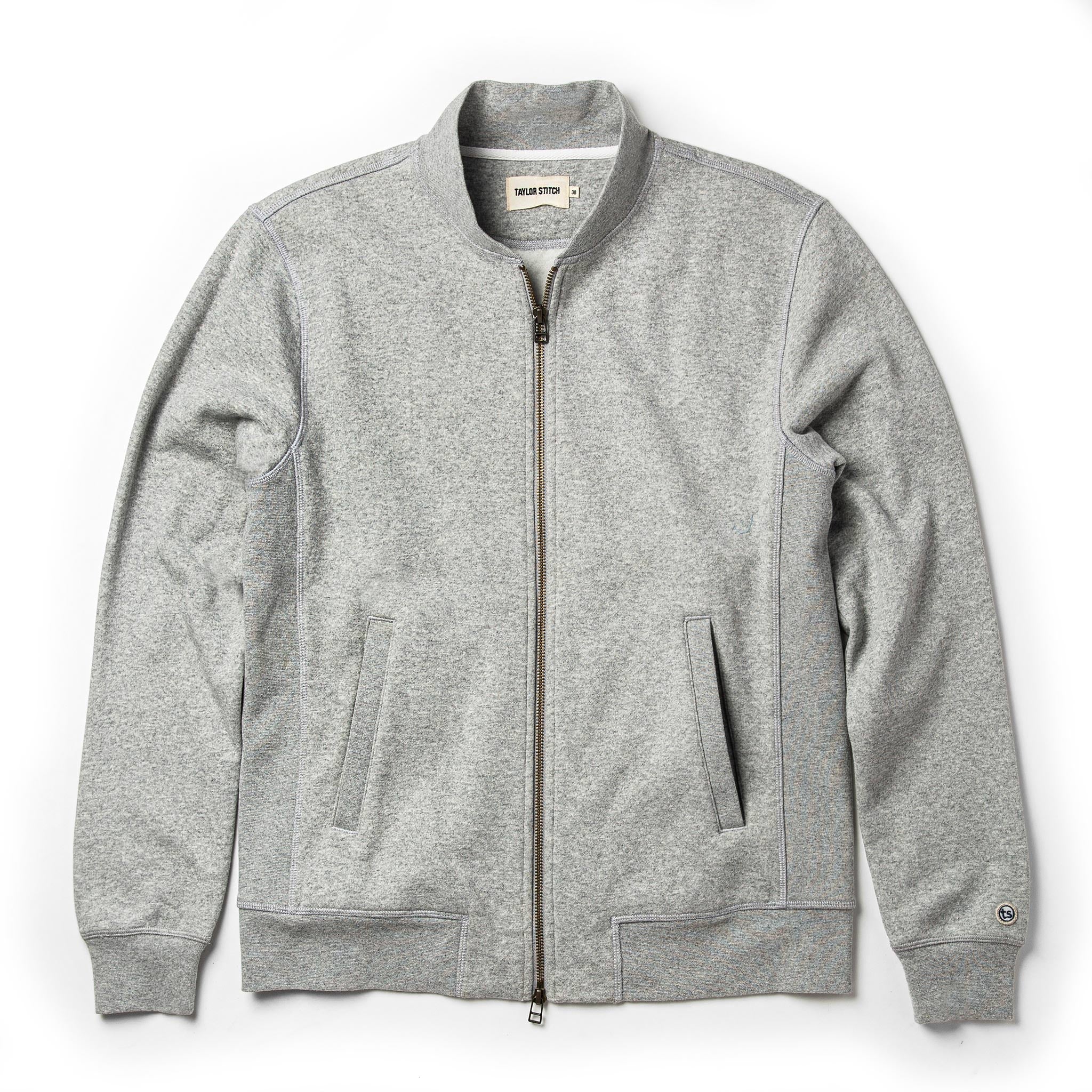 flatlay of The Heavy Bag Bomber in Heather Grey Fleece from the front zipped up, Knits by Taylor Stitch