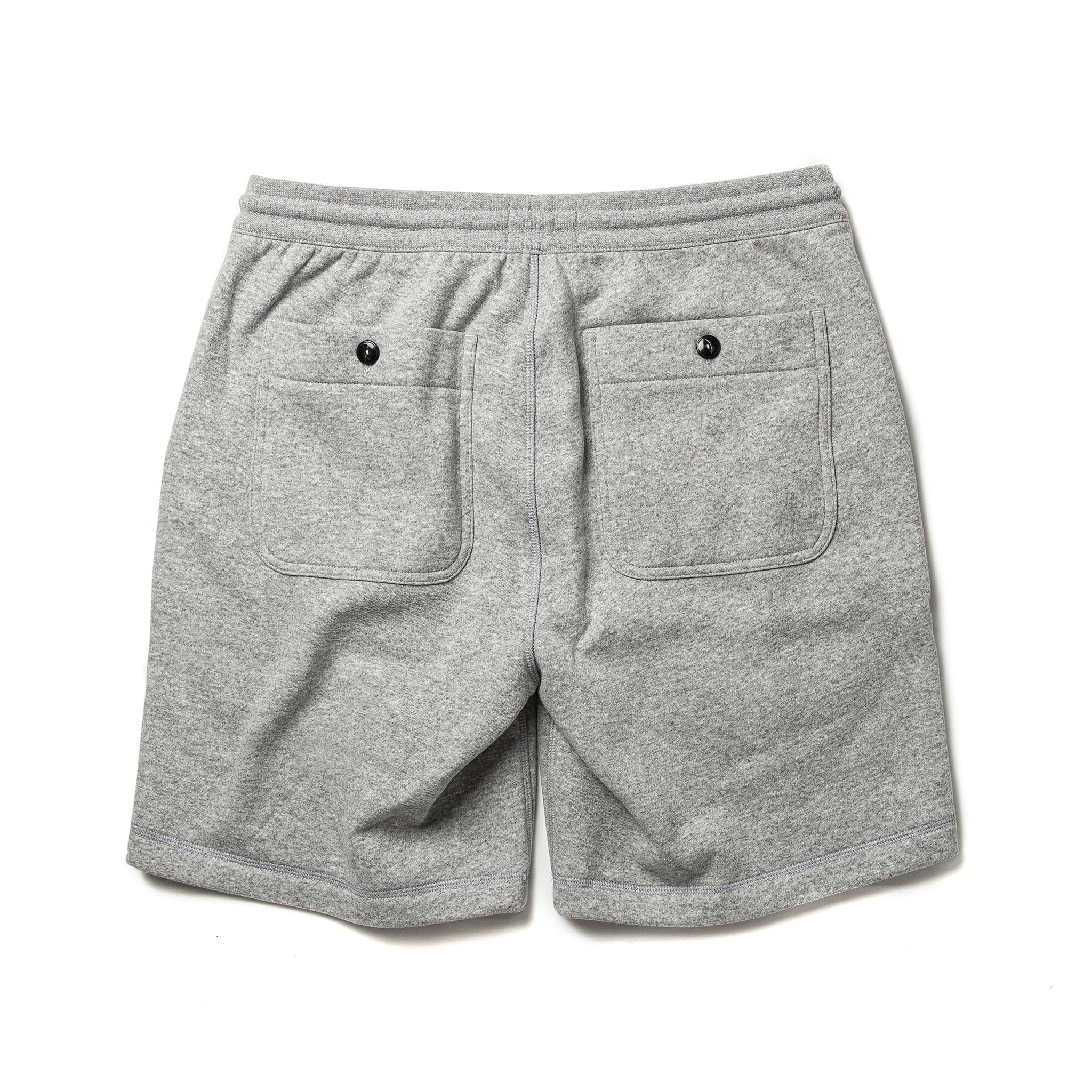 Flat shot of back of The Heavy Bag Short in Heather Grey Fleece, Pants by Taylor Stitch