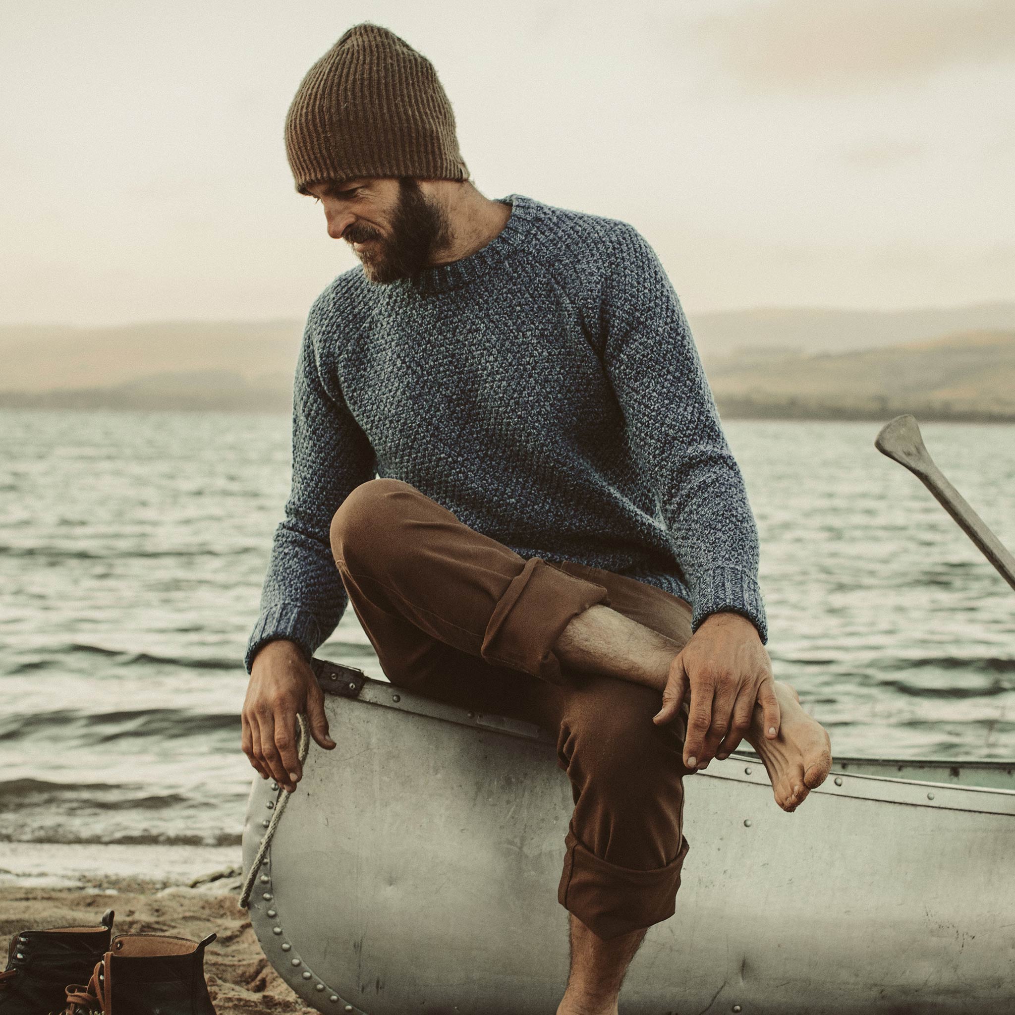 David about to go out on his canoe in our fisherman sweater , Knits by Taylor Stitch