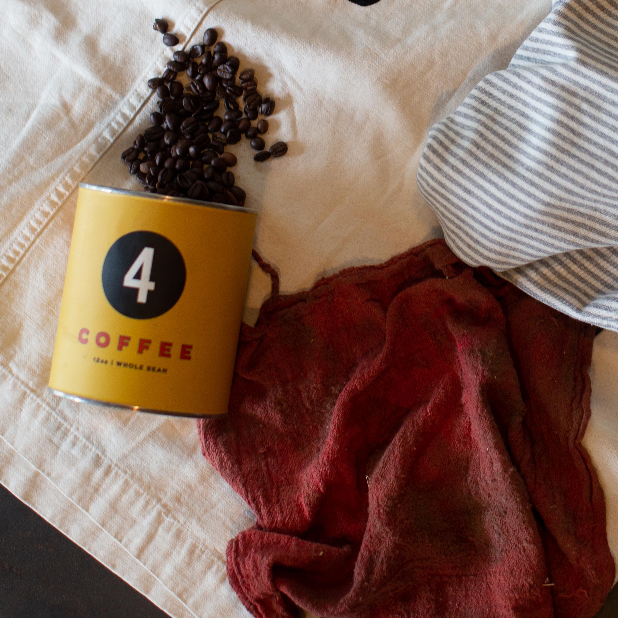 Four Coffee Tin - Sunday Motor Club Blend material shot,  by Taylor Stitch