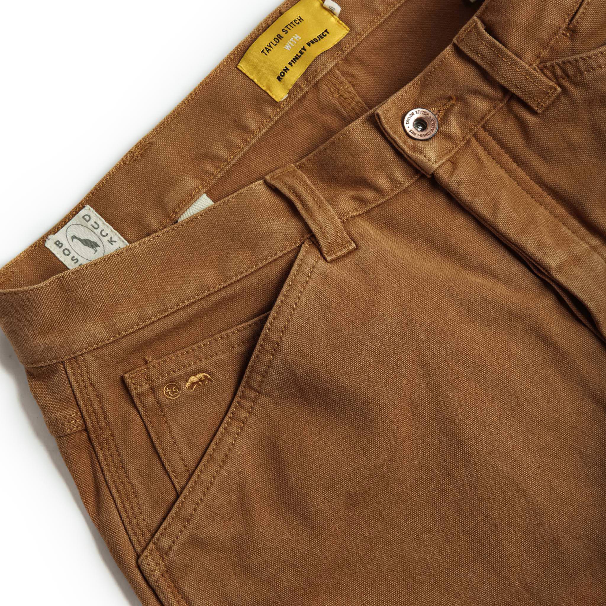 material shot of waistband of The Carpenter Pant in Cedar Boss Duck, Bottoms by Taylor Stitch